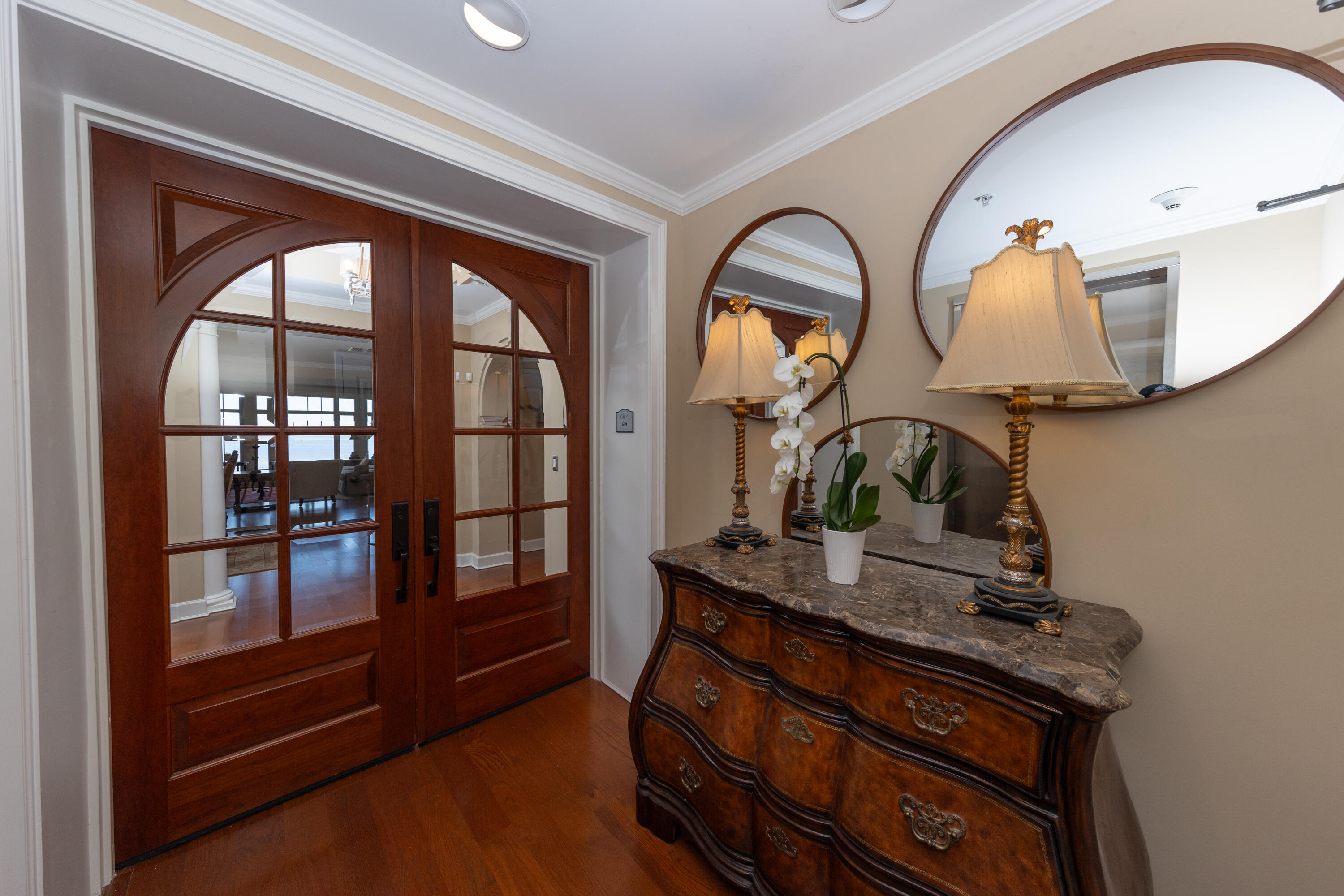 Entering the 2 Bed/2.5 Bath you immediately see the incredible sweeping view of Choctawhatchee Bay, as you gaze past the trees and the signature hole of the beautiful Kelly Plantation Golf Course. As you approach this vista, you are now overlooking the serene waterscape garden area. Inside, the chef's kitchen is equipped with Viking appliances, tile flooring and granite countertops. One Water Place features a state-of-the-art fitness facility, steam room, sauna, indoor whirlpool and massage therapy rooms. OWP is pet friendly and includes a fenced in dog park. There are two assigned, underground, deeded parking spots. Owner Pride is shown throughout, and an inspection has been completed pre-list with minimal areas to be remedied. Seller to provide a carpet allowance or a credit at close.