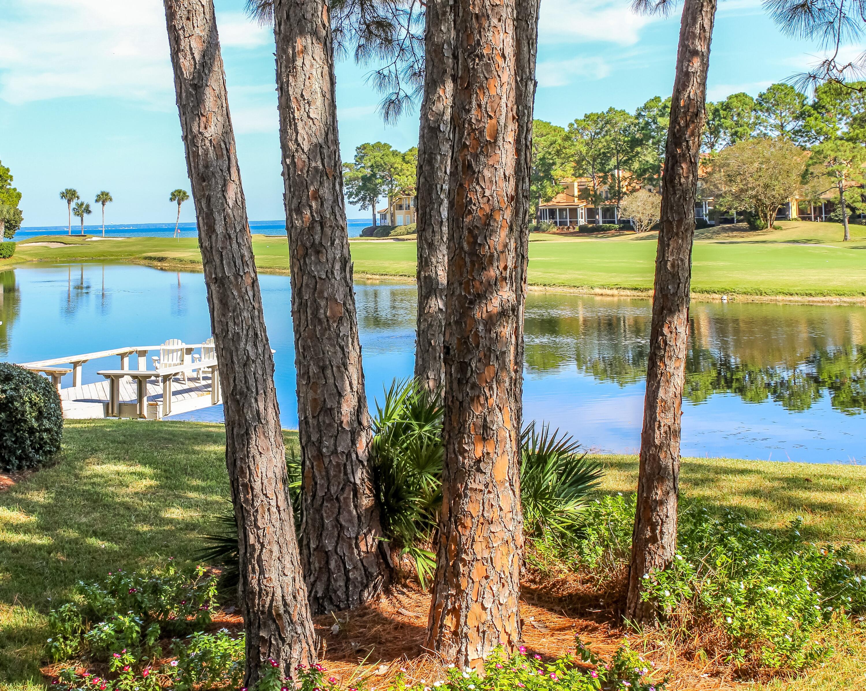 Welcome to your perfect coastal retreat at 176 Cove Drive, ideally located in the highly desirable Fairways neighborhood of Sandestin. This beautifully updated 2-bedroom, 2-bath cottage offers the ideal blend of comfort, style, and convenience—perfect as a primary residence, second home, or turnkey investment property.

Offered fully furnished and rental-ready, this home also includes the added peace of mind of a whole-home Generac generator. Step inside to discover a thoughtfully renovated kitchen featuring modern finishes, ideal for effortless entertaining or relaxed meals after a day on the beach or golf course.
QUARTZ White Carrara counters installed in kitchen February 2026.  
The open-concept living and dining areas are light-filled and welcoming, with large windows that frame stunning views of both the golf course and the bay. Tasteful furnishings enhance the space, creating an inviting atmosphere for everyday living or hosting guests. Both bedrooms are generously sized, while the updated bathrooms offer modern comfort and style.

To complete the lifestyle, a 6-seater golf cart is available for purchase separately, fun for enjoying everything Sandestin has to offer, from pristine beaches and championship golf to shopping, dining, and entertainment.

This is effortless Sandestin living at its bestmove-in ready and ready to enjoy.
