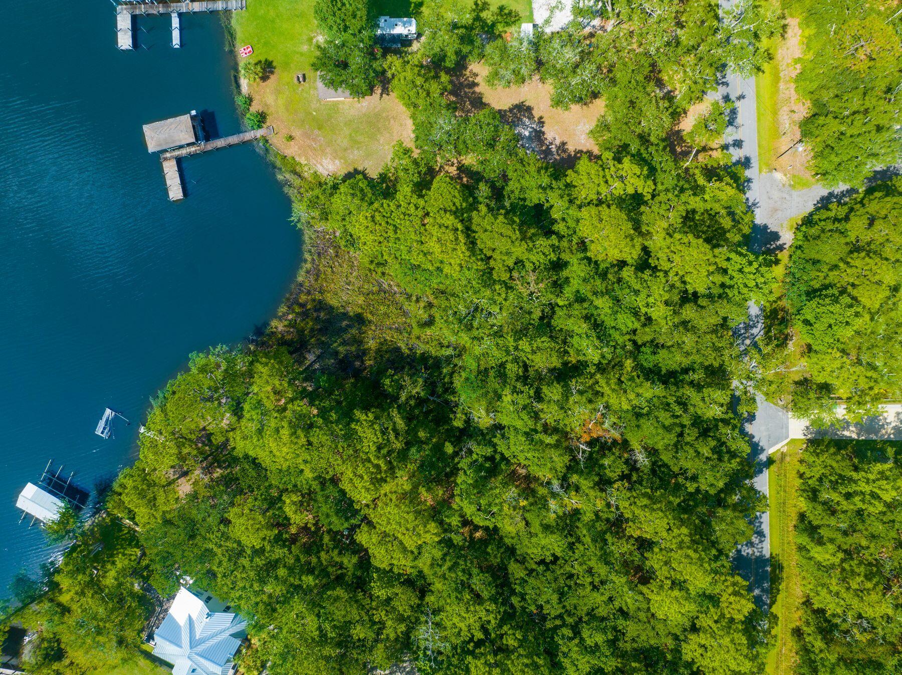 Discover your boater's paradise on this stunning bay front lot in Freeport. Build your dream home and dock, indulge in panoramic views of Choctawhatchee Bay. Nestled on a serene, private street, yet close to all of Freeport's amenities, this lot offers the perfect blend of tranquility and convenience. Embrace waterfront living at its finest—your opportunity awaits!