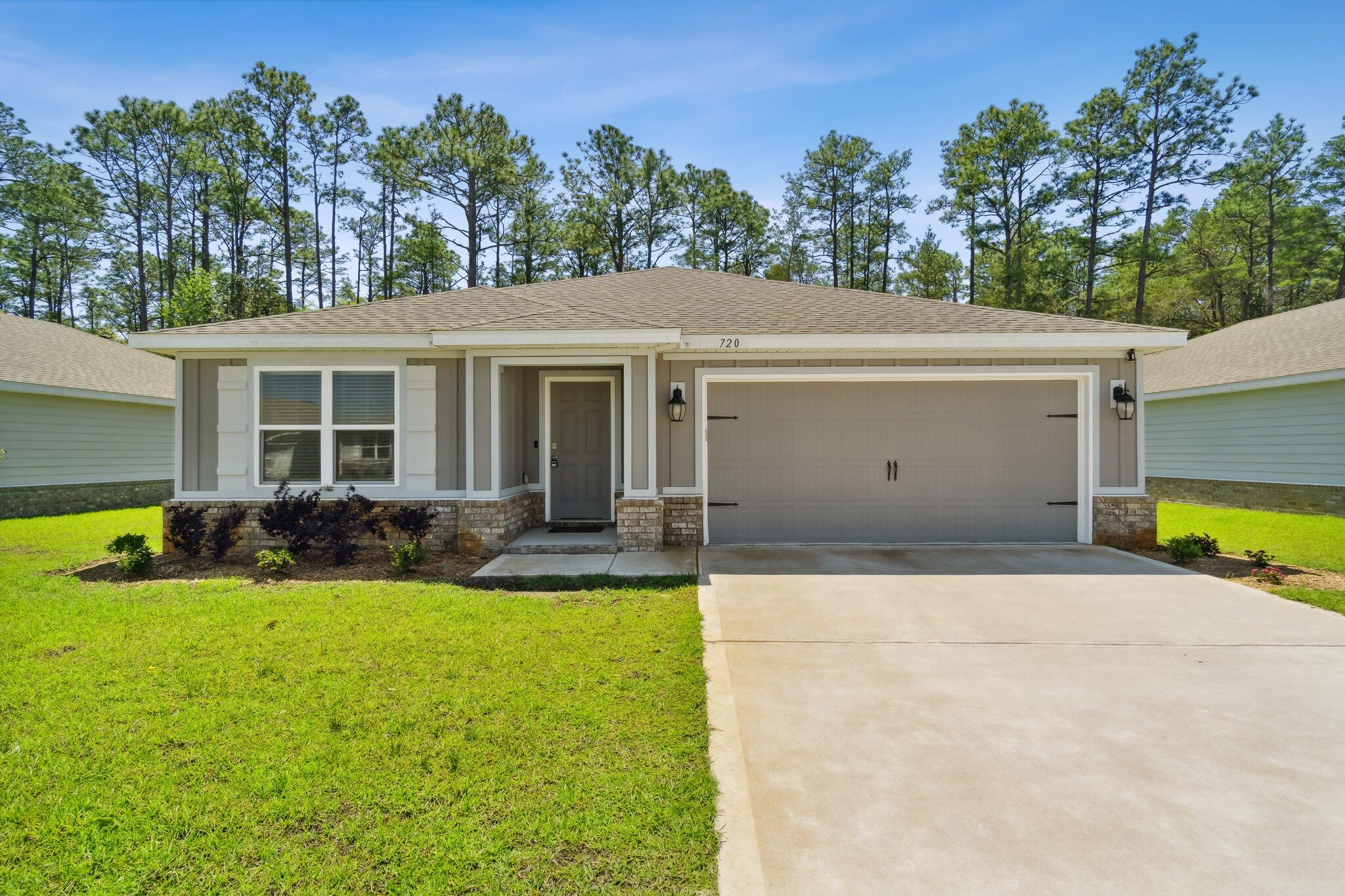 Welcome to this beautiful 4 bedroom, 2 bath home in Freeport's newest neighborhood Riverwalk! Plenty of space with 2122SQFT with 2 car garage. Master bedroom features a walk in closet and spacious bathroom with double vanity. Home is complete with stainless appliances, granite countertops, laminate and carpeted flooring and a nice sliding glass door to the wooded view back patio! Community clubhouse, pool and fitness center opening in time for summer! Community dock with access to Lagrange Bayou. Only 12 mile drive to the beach! The Beach Sunsets Inc. Resident Benefits Package is designed to provide convenience and professional services to our residents. By applying, Resident(s) agree to be auto-enrolled in the program and pay an additional $25.00 each month, payable with rent. This program includes benefits such a Tenant Portal for online payments, 24/7 maintenance requests, air filter(s) auto shipped to your door, waived lease, lease change and administration fees and more! Benefits of this package may vary due to the property specifications. No discount will be given if an element of the package is not available. The cost of this package is all-inclusive.