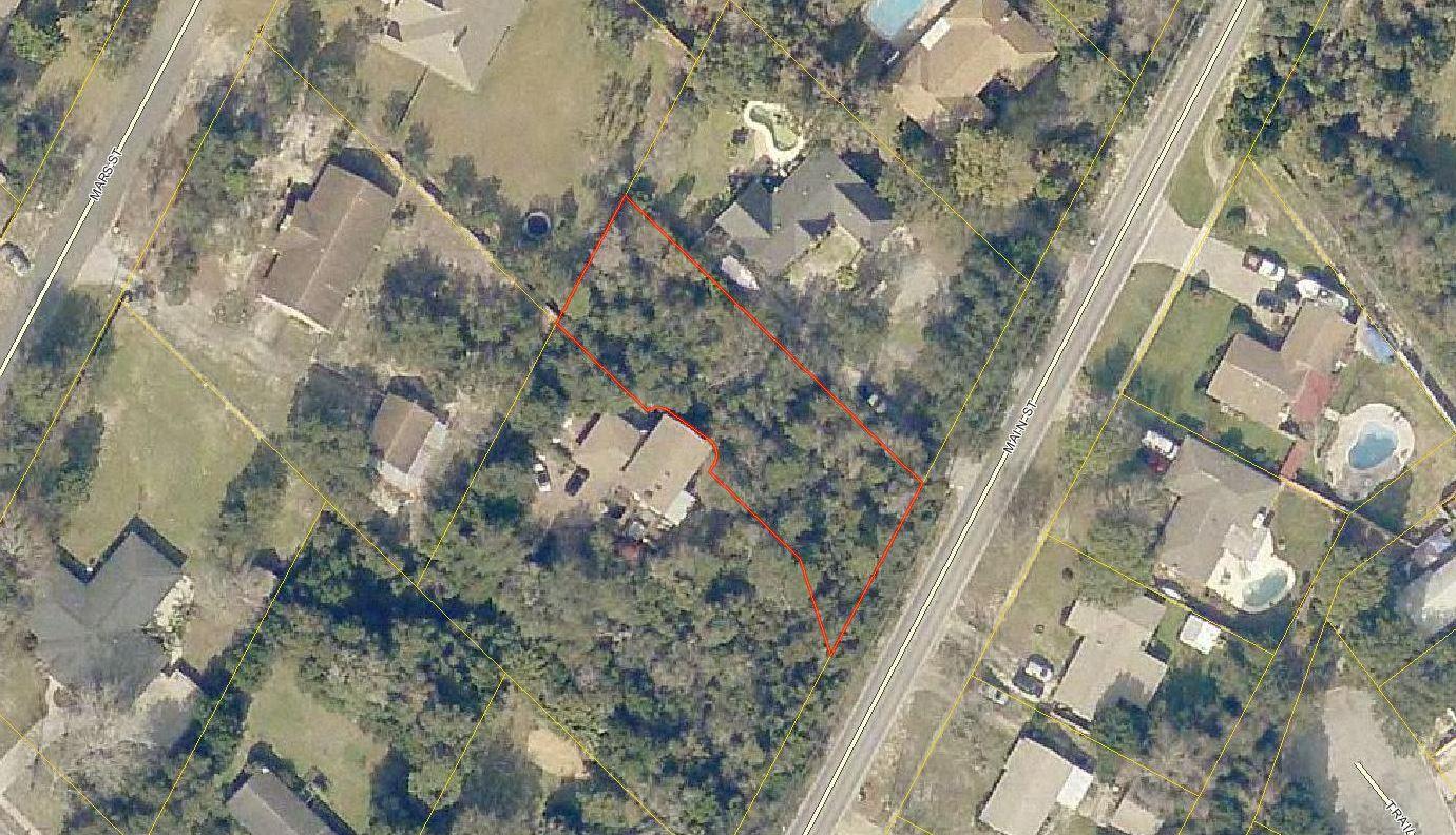 Vacant land right in the heart of Destin! Seller will consider owner financing and new home construction. Lot dimensions should be verified.