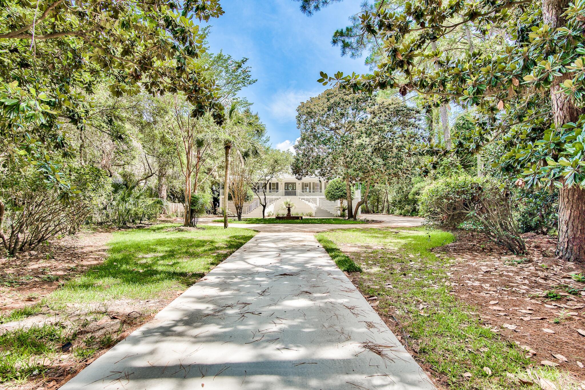 Currently under contract wtih kick-out clause 
Located in the heart of Destin this renovation rivals any HGTV reality show! Decked out with  5 bedrooms/4 baths this estate is ready for a new family. This home sits on over one acre with 100+ feet of waterfront on Choctawatchee Bay making it great for all boat lovers! Century old pine trees and lush foliage provide lots of privacy.  A rare diving pool,  hot tub, pool side snack bar and a 900 sq. ft. dock with both a boat and jet ski lift offer you the best of bay side living. A notable feature of this property is that it sits 'high and dry' and does not require flood insurance. Current owners reconfigured this Old Florida style home to maximize the waterfront views and floor plan.  From the front door you'll appreciate the fresh, new feel as well as the attention to detail in every roo

The Retro theme throughout the house makes this home ultra modern while evoking comforting memories. The kitchen boasts not one but two full size ovens (both gas and electric), a wine fridge and plenty of storage. The elevator makes moving groceries from the trunk to the pantry a breeze.

Taking this home down to the studs allowed the designer to add a stairwell, two new bedrooms,  a new bath and a dedicated laundry.  The five + car garage offers ample storage and a work bench with new LED lighting. From the new roof to the new driveway and the entirely new interior you'll feel as if you're in a newly constructed home but one that was built like a fort from days gone by.