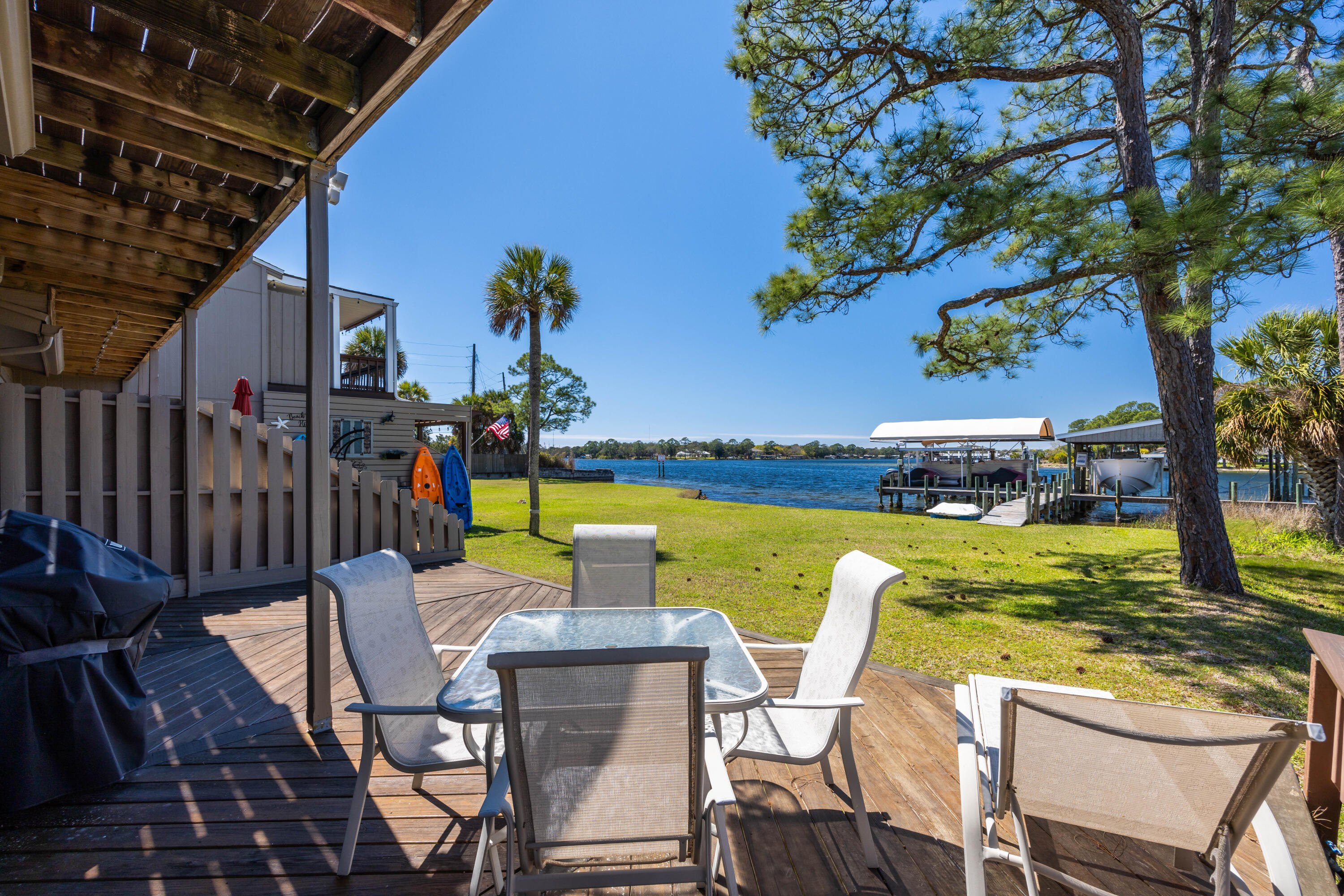 Boating and Fishing Enthusiasts!  Rarely Available, Waterfront Townhome w/ Boat Slip & Lift! This spacious 2,066 sq. ft furnished townhome features 3 bedrooms, 2.1/2 baths and a 1 car garage.  The seller has made many upgrades, including a beautifully updated kitchen w/ granite counter tops and stainless appliances, beautiful new shower, lot's of storage,  first and second floor water front decks, the HVAC unit was replaced 4 years ago and the roof has been recently replaced.  The boat slip will accommodate a 30' boat and includes an 8,000 lb. capacity boat lift.  The boat lift cables have been upgraded, replaced and well maintained.  There is no active Home Owner's Association, however the individual owners contribute $100. per month for boat dock maintenance.