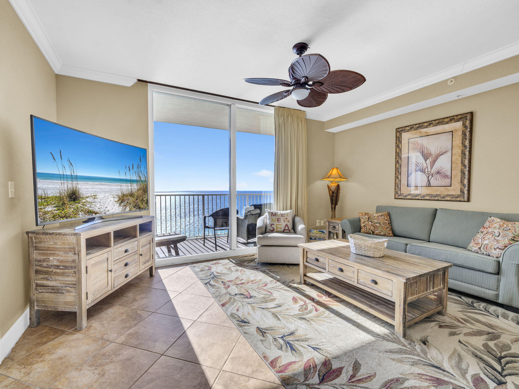 Escape to paradise in this stunning Gulf-front condo at Tidewater Beach Resort!  Imagine spending every winter here, curled up with coffee as waves crash outside--completely escaping those northern chills, just like the sellers did for many years--while summer rental income helps cover the bills!  This beautiful 1,593 sq ft condo features two cozy bedrooms, two spacious bathrooms, and sleek tile floors throughout an open, airy layout flooded with natural sunlight. You'll love the high-end kitchen (perfect for actually wanting to cook!), plus high-speed internet to stay connected with friends and family. It's an ideal setup for full-time living, too--and you'll enjoy Florida's no state income tax benefit!  Tastefully furnished and move-in ready for instant comfort.  But that's not all: Tidewater's incredible amenities await! Jump into two massive lagoon pools or the heated indoor pool, unwind in the Roman spa, pump it up in the 4,300 sq ft fitness center, catch a movie in the on-site theater with stadium seating, or mingle at the beachfront restaurant and bar for sunset toasts.  Can't you already picture yourself here, waking up to breathtaking waves and sugar-white sand beaches?