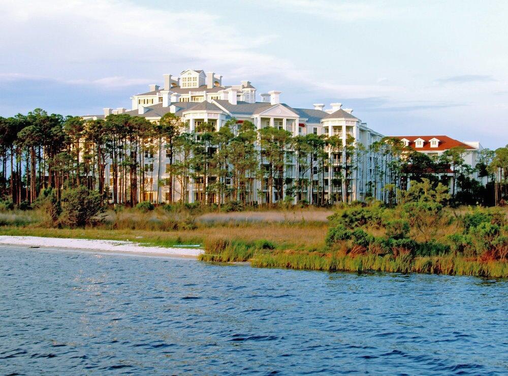 Welcome to Lasata 3401 and 3403 - an incredible, unique investment that offers multiple rental configurations for you and your guests. These two connected condominiums provide options for vacationers to rent a one, two, or three bedroom unit, allowing you potential income from groups of 2 to 10 people!

SELLER will consider PAYING down buyer's mortgage interest rate or PAYING 3 months of HOA dues with acceptable offer.

Unit 3401, known as the ''Coconut Cottage,'' is a gorgeous two bedroom, two bath condo on the 4th floor of the Lasata high-rise in the stunning Sandestin resort. Light tones, modern décor, and all the comforts of home ensure that everyone enjoys relaxing in this open concept space.  The living area offers plenty of seating and flows seamlessly into the dining area with a table and chairs for 6.The floor to ceiling windows and sliding glass doors provide beautiful natural light, and the wrap around balcony is the perfect place to enjoy your morning coffee or happy hour beverage. With bar height seating at the granite countertop, your guests can chat with the 'chef' in the house as they put the ample kitchen supplies to good use.
King beds in each bedroom and the pull-out couch ensure that your visitors will rest well in the comfort of this spacious condo. The larger bathroom is ensuite to the primary bedroom, with a double vanity, large walk-in shower, and separate tub giving your guests plenty of space to clean up between a day at the beach and a night on the town.
You'll notice a locked door at the end of the hall to the left . . . wait, there's more! Through that door, you'll find Unit 3403, the delightful "Grand Getaway." Inside this perfectly sized studio, up to 4 more guests will sleep comfortably on two queen beds, savor sips or bites on their own private balcony, and make good use of the microwave and fridge in the mini-kitchen. The bathroom is easily available for everyone, and the extra shelving gives each person plenty of room for their essentials.
When you purchase this condo, you have the option of renting the 2-bedroom 3401 and the studio 3403 separately, or allowing guests to rent both units together. What an incredible and unique benefit for you and your vacationers! 
Nestled within the trees of Sandestin, Lasata is part of a popular visitor and local favorite - Baytowne Wharf. Activities vary throughout the year in Baytowne, and regardless of the season, you can always find something to do. Do you enjoy the outdoors? Vacationers and owners alike have quick access to bike trails, golf, tennis, ziplines, boating, jetskis, and much more. Are you a foodie? From gelato to gumbo or coffee to cocktails, more than 20 dining establishments provide an array of restaurants, cafes, and bars to choose from. Shop till you drop within Baytowne or venture to the nearby Grand Boulevard or Silver Sands Outlet Mall . . . the possibilities are endless! As if that isn't enough, the party continues into the night with live music, summer concerts, and dancing. With the many restaurants, stores, events, and activities of Baytowne Wharf, as well as the access to multiple pools, hot tub, and fitness room within Sandestin, your guests will be thrilled to enjoy the beach or the resort and return to their luxurious Lasata condominium.