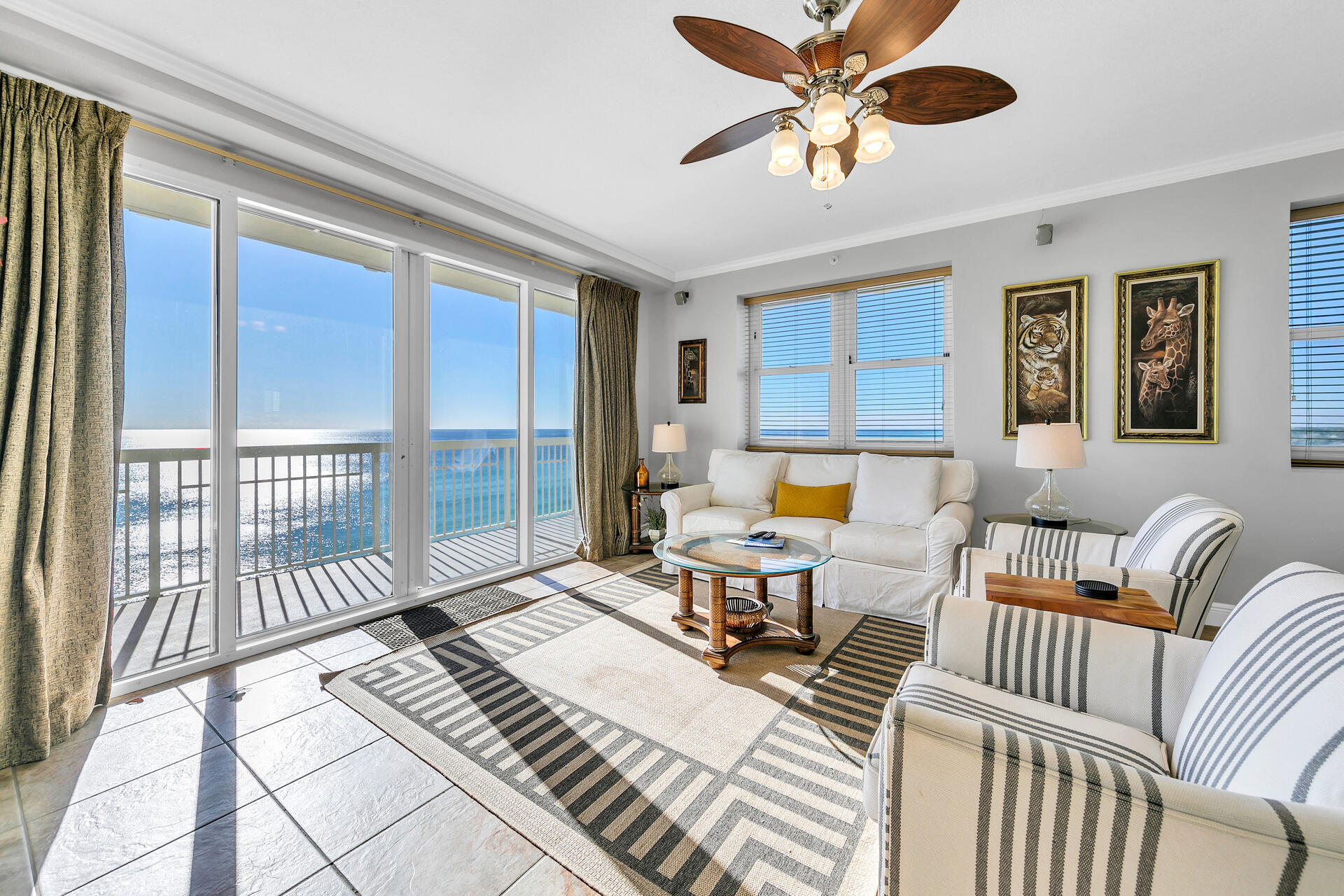 THE BEST OF THE BEST AT CELADON! Welcome to Celadon unit 909—a rare, premier west-end gem offering unobstructed, world-class views of the shimmering white sands and emerald waters of the Gulf of Mexico. This stunning Gulf-front condo boasts a prime mid-stack location within the luxurious 23-story Celadon complex, making it a perfect blend of elegance, comfort, and convenience. With an open floor plan, 9' ceilings, and expansive floor-to-ceiling sliding glass doors and windows, this unit is bathed in natural light, providing breathtaking Gulf and sunset views year-round from the balcony, living room, dining area, kitchen, and master suite. Whether you're entertaining or enjoying a peaceful retreat, this space offers the ultimate coastal living experience. . Coastal Luxury Meets Condo Convenience! Designed with a chic coastal ambiance, this condo lives like a beach house while offering all the perks of condo ownership. It's a turnkey property, fully furnished, tastefully decorated, and rental-ready. The ceramic tile flooring throughout ensures easy maintenance, while the gourmet kitchen is thoughtfully designed with ample storage, a full pantry, and all the essentials included. Alfresco Living at Its Finest Step onto the private wraparound balcony for panoramic views that will leave you breathless. From sunrise to sunset, this generous outdoor space is perfect for relaxing, entertaining, or simply soaking in the beauty of Panama City Beach. The luxury master suite is nothing short of spectacular, positioned front and center on the beach with direct balcony access through glass sliders. Wake up in the king bed to unparalleled sunrise and sunset views without ever leaving your room. The suite also features a spa-like private bathroom with a double vanity, walk-in shower, and a separate Jacuzzi tub, plus a large walk-in closet for added convenience. The second bedroom is generously sized and can accommodate a king bed. The third bedroom features its own west-facing window with stunning views. With ample closets throughout and an oversized laundry room equipped with a full-size washer and dryer, this condo is designed for both convenience and functionality. The unit can sleep up to 10 people, making it ideal for families, vacation rentals, or full-time living. Nestled on the peaceful west end of Panama City Beach, this beautiful Gulf-front condo offers the best of both worlds: tranquility and convenience. Located just 10 minutes west of Carillon Beach and 30A, and under 10 minutes east to the vibrant attractions of Pier Park and Frank Brown Park, this prime spot gives you easy access to everything the area has to offer. Resort style amenities including 283' of Gulf frontage, heated Gulf front pool and spa, indoor/outdoor heated pool, 2 hot tubs, tennis court, media room, meeting/conference room, fitness facility, on-site rental office, 3 high speed elevators plus a 4 level parking garage with walk-over to the lobby and rental desk. Whether you're looking for a second home, a full-time residence, or a high-performing vacation rental, Celadon unit 909 is your perfect match. Don't miss the opportunity to own this exceptional property on the Emerald Coast!