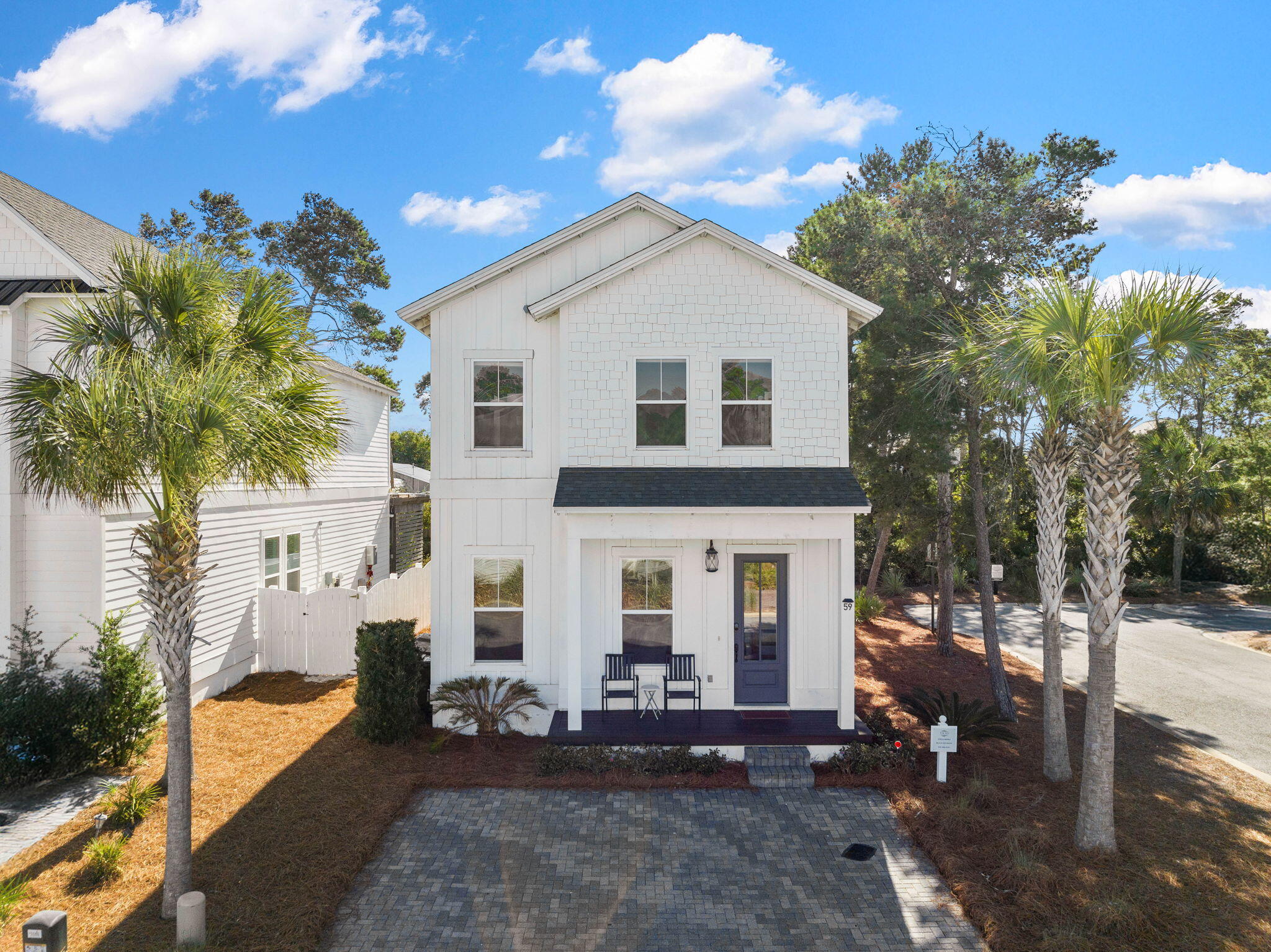 Welcome to 59 Valdare Way, where comfort, style, and convenience converge in the heart of the vibrant Inlet Beach community. This exquisite 3-bedroom, 2.5-bath home, constructed in 2019, is perfect for both primary residents and investors, offering no rental restrictions for optimal flexibility.

Situated just half a mile from one of the largest public beach access points on the Emerald Coast, this home provides easy access to pristine sands and the charming entrance to Rosemary Beach along the iconic 30A. The exterior boasts crisp white Hardie siding, a sleek black roof, and a gray paver driveway, creating a striking curb appeal. Inside, the home features beautiful wood-look tile flooring, plush carpeting in the bedrooms, and thoughtful design details throughout. The gourmet kitchen is a chef's dream, equipped with upgraded countertops, a mosaic tile backsplash, stainless steel appliances, a 30-inch gas cooktop, and soft-close cabinets and drawers. The open-concept layout seamlessly connects the kitchen to the living and dining areas, making it an inviting space for gatherings.

Upstairs, a spacious 21' x 20' bonus room offers endless possibilities, whether you envision a media room, home office, or play area. Additional highlights include shiplap accent walls along the stairwell, a frameless glass shower in the primary suite, and upgraded finishes in the bathrooms.

This home is an ideal choice for a primary residence, vacation getaway, or income-producing property. Schedule your showing today and experience the best of coastal living at 59 Valdare Way!