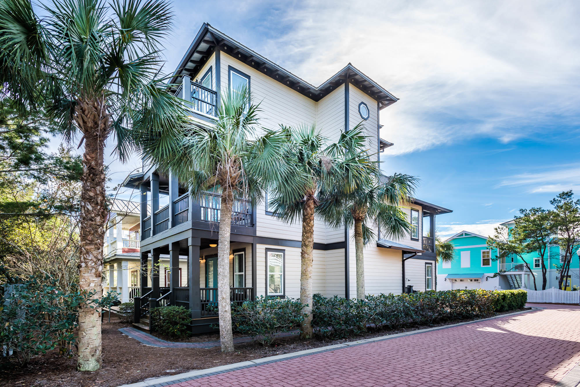 This beautiful Seacrest Beach home sleeps up to 14 guests, making it a reliable source of rental revenue as well as a spacious and comfortable beach retreat for homeowners. The home has an established rental history of $63K, trending toward $72K. The newly-painted ground floor features the kitchen and main living area as well as a junior master suite, plus access to the two-car driveway and a charming back yard. On the second floor are the master suite with large master bath as well as another junior master suite. The third floor is where you'll find a second living area complete with full bath, wet-bar, and spacious deck with seating for all, along with a bunk room with twin-over-full bunk beds that work for children or adults. Tasteful hardwood floors and well-made furnishings throughout the home add style and durability, making this a turn-key purchase with spring break bookings already on the calendar. Seacrest Beach has long been a favorite of 30A visitors. Swimmers can lead the way to the famous 12,000-square-foot lagoon pool in two minutes or to the beach in five (or call the free neighborhood shuttle for a ride). Early risers love to start the morning at Alys Beach's Raw and Juicy, open from 7:00 am  2:00 pm., and located a few blocks to the west. Let the late sleepers wind down with a glass of wine in one of the charming eateries at Seacrest Beach's growing commercial area or Rosemary Beach, both an easy walk.