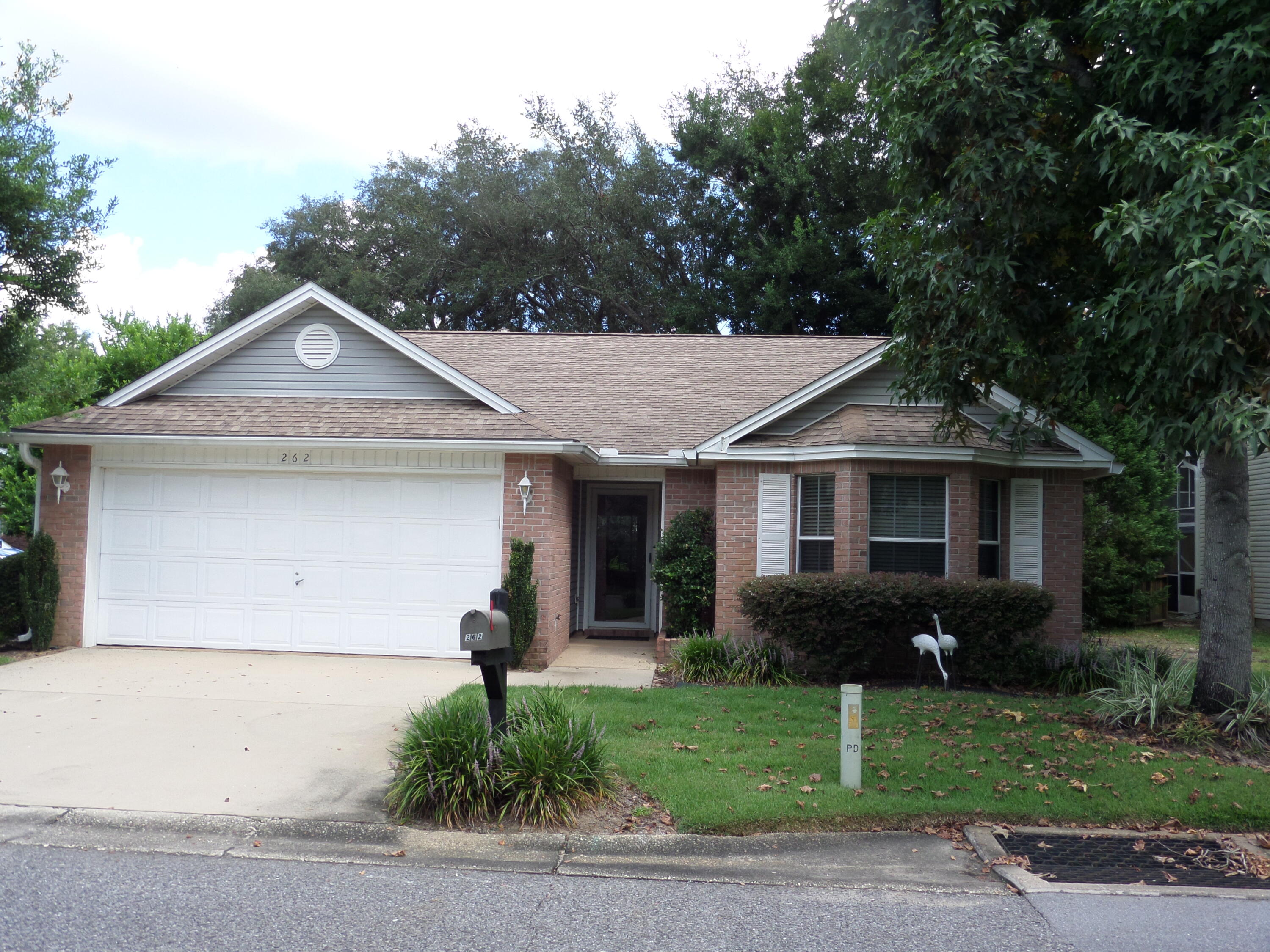 Home is located on a corner lot in Parkwood Circle. This bright open 3Bedroom/2Bath brick ranch is in excellent condition and has upgrades, list is attached. Home offers a private Court yard with a patio, No lawn to be cared for. HOA Maintains exterior grounds. Home offers 2 possible dining areas. 
SELLER IS INSTALLING A NEW GARAGE DOOR & OPENER AND A NEW ROOF.
A must see.
Home is handicap accessible.