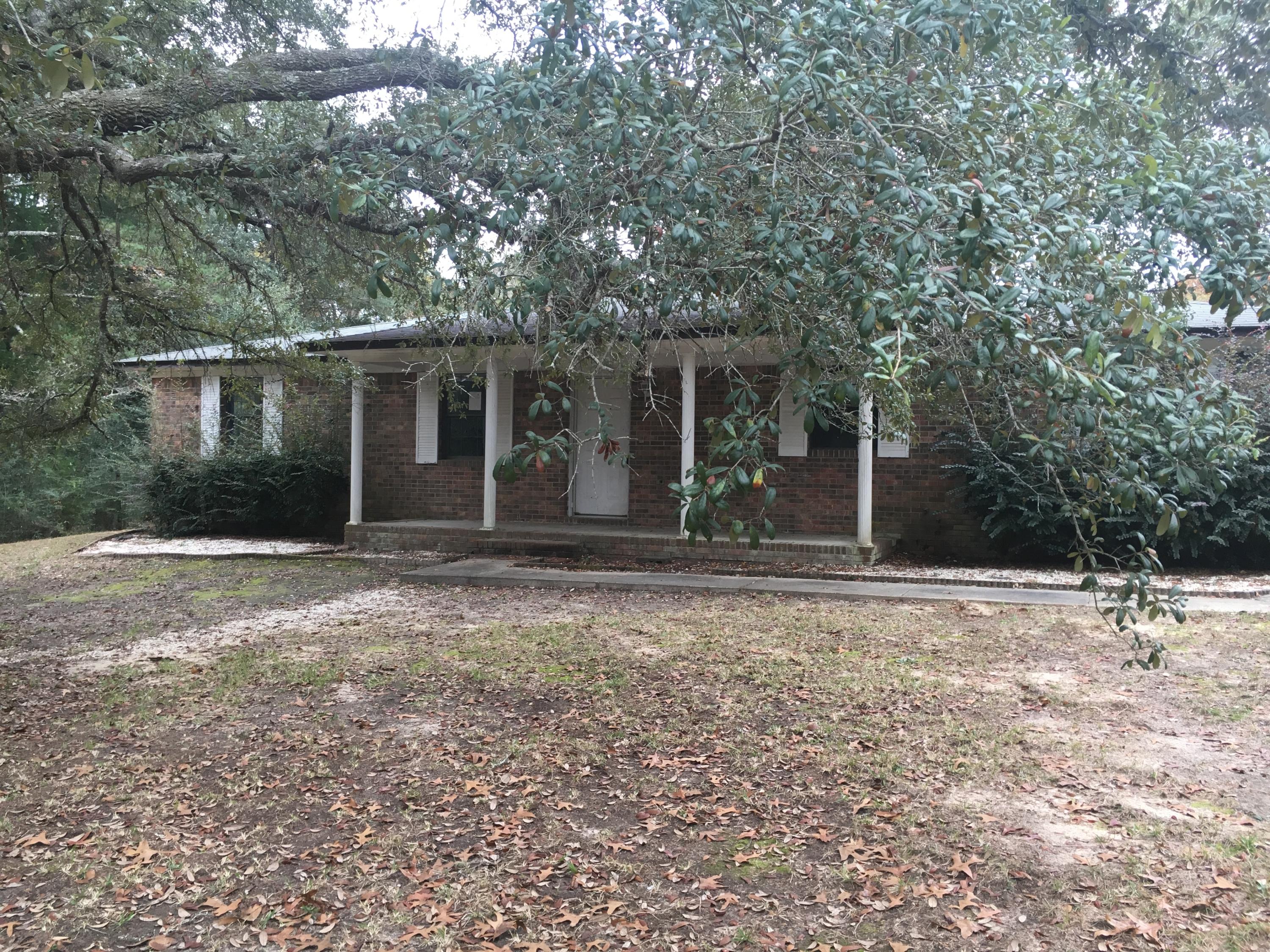 REO. Priced @ $42,900.00 Looking for privacy? Want to live in the country? This home features 3 bedrooms with 2 full baths. Home is brick and sits on .85 acres. Large kitchen with breakfast bar and wood burning fireplace as focal in living room. Flex space which can function as den or fourth bedroom. Sold as-is, where is. Bank of America, NA employees, household members and HTS business partners of the bank are prohibited from purchasing this property, whether directly or indirectly. Call agent for details.