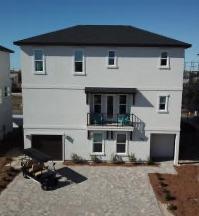 This brand new 5 bedroom 5 1/2 bath home has been well thought out with fun and family and luxury in mind.  Just a short walk or golf cart ride to the beach or just across your lightly traveled street (end of the cul de sac) to the seasonally heated pool to enjoy with your family and friends.  Each bedroom has an en suite, there is one set of washers and dryers on the first floor and a second set on the 3rd floor.  The entire home has the same wood floors throughout in living and sleeping areas with matching quartz, self closing drawers and premium tile in wash areas.  3/6 will start the season which already has almost 40K in rental and still lots left to book for the season.
