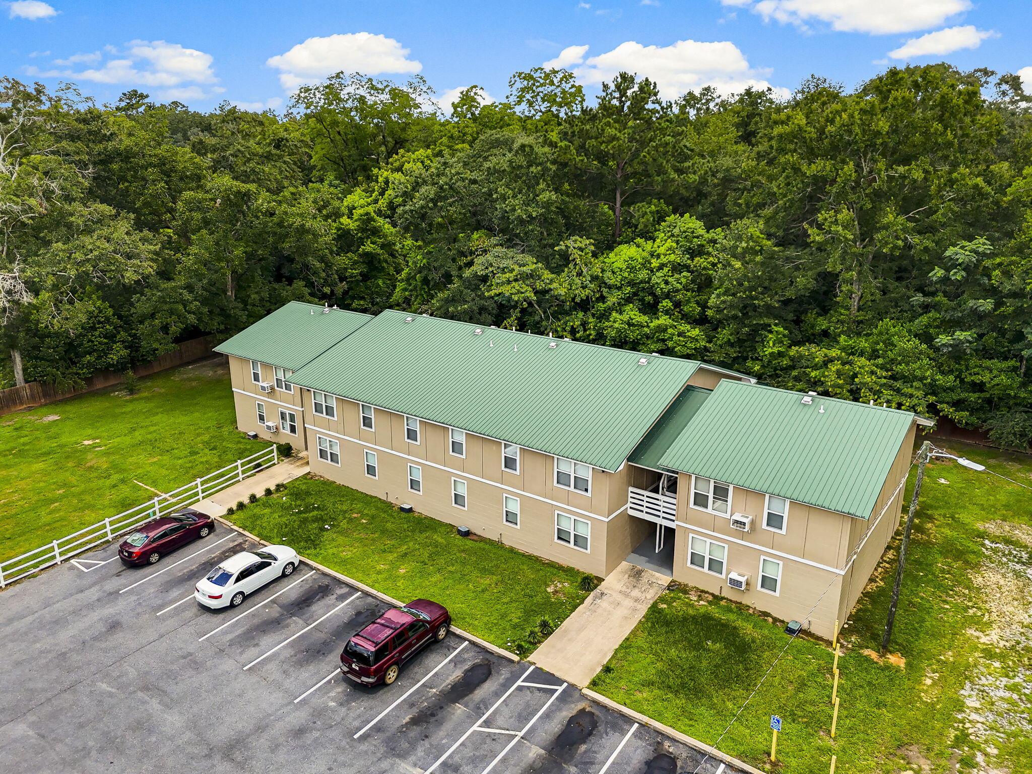 INVESTORS -- $50K PRICE REDUCTION. Deerwood Apartments is a fully occupied 16-unit multifamily asset offering immediate cash flow and clear upside. Unit mix includes (8) 1BR/1BA and (8) 2BR/1BA units. Recent ~$350K in improvements: new septic, parking lot, exterior paint, updated laundry facility (additional income), plus 8 fully renovated units and 8 refreshed units. Roof replaced 2019. Strong in-place income with below-market rents provides a path to increased NOI. Located near I-10 and the growing Hwy 77 corridor with consistent rental demand. Turnkey asset with minimal CapEx and built-in upside at a newly improved price. Conveniently positioned near I-10, shopping, dining, and medical services, the property also benefits from Chipley's continued revitalization and growth along Hwy 77. With strong rental demand, recent improvements already in place, and a strategic price reduction, Deerwood Apartments offers stability today with long-term upside for savvy investors.