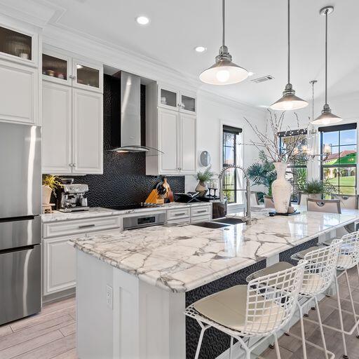 Head and shoulders above the rest, this turn key, luxury  home in the heart of Sandestin offers a level of finish and attention to detail unmatched in the community of Villa Lago.
Immediately upon entering the home you are greeted by the sweeping foyer and views through the kitchen. The kitchen is finished with brand new, top of the line appliances, lighting and cabinetry.
4 beds, 4 baths, private office off the master, tile flooring throughout the entire home, matte white porcelain in all bedrooms and bathrooms, high end furnishings, brand new appliances, a new Star golf cart, and so much more make this the truly turnkey home you have been waiting for. See document section for full list of inclusions and finishes