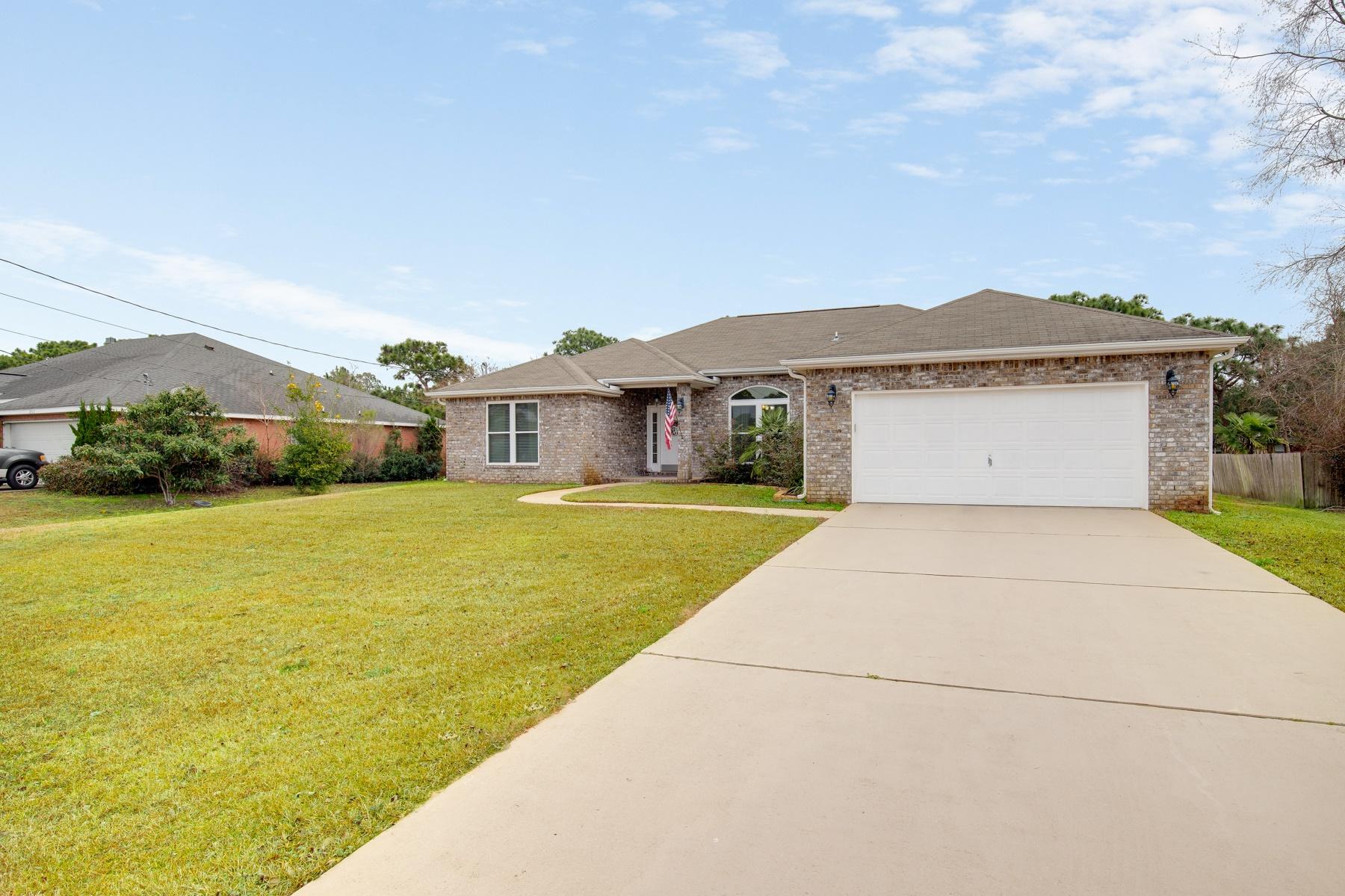 Small Pet allowed with Approval!~ 4 Bdrm / 2 Ba PLUS Formal Dining Area in Navarre's Premier Subdivision of Holley by the Sea! ....Have a Large Family?... Like to Entertain?... This is the Home for your Family! Huge Kitchen w/Granite Countertops / Breakfast Bar / Breakfast Nook / Pantry / Kitchen opens to the Spacious Living Area w/Fireplace!~ Master Bath has 2 Closets / Double Vanity / Separate Tub & Shower / Private Commode Area! Other Features Include: Split floor Plan / Indoor Laundry w/Washer & Dryer / 2 Car Garage / Sprinkler System / HUGE Yard Building! Enjoy all the Amenities Holley by the Sea has to offer... 3 Pools / Sports Courts / Fitness Center / Youth Center / Playground / Waterfront Dock & Picnic Areas / Boat Ramp.. more!! Back yard is not fully fenced. Renter to Verify All Dimensions and Information!
