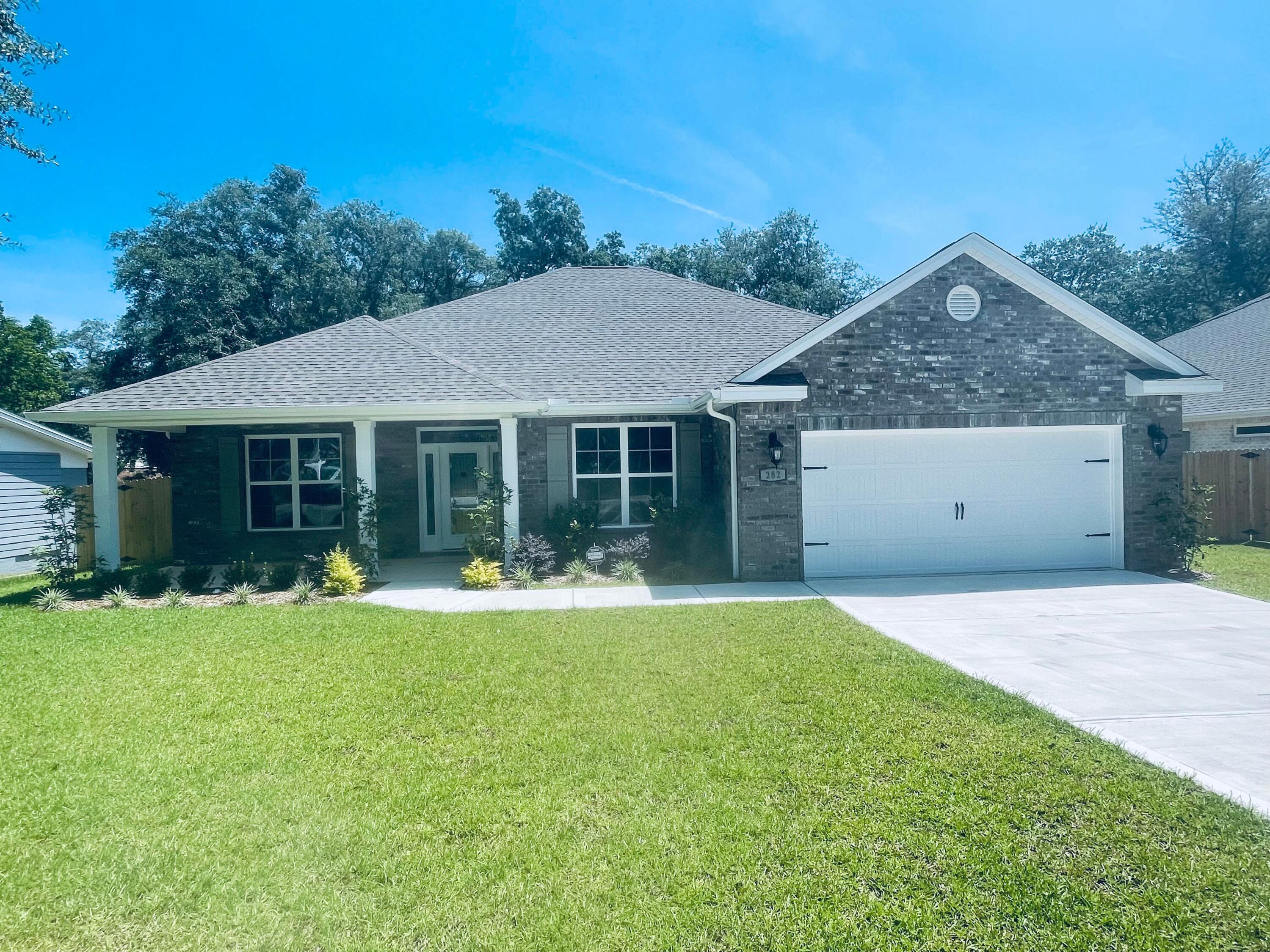 AVAILABLE... July 10, 2023! 4bed/3bth home centrally located to Eglin AFB & beaches. This home boasts a spacious Living Room with beautiful tray ceilings & crown molding that opens to the Kitchen & Dining Area. The Kitchen offers white cabinetry, quartz countertops, & tile backsplash. Wood plank tile flooring in all rooms except bedrooms (carpet). Master Bedroom offers tray ceilings & the Master Bath has double quartz vanity, marble tub, & a beautiful marble walk in shower with glass doors. NO smoking. Small, trained dogs allowed upon approval with a non-refundable pet fee. Lawn care included.