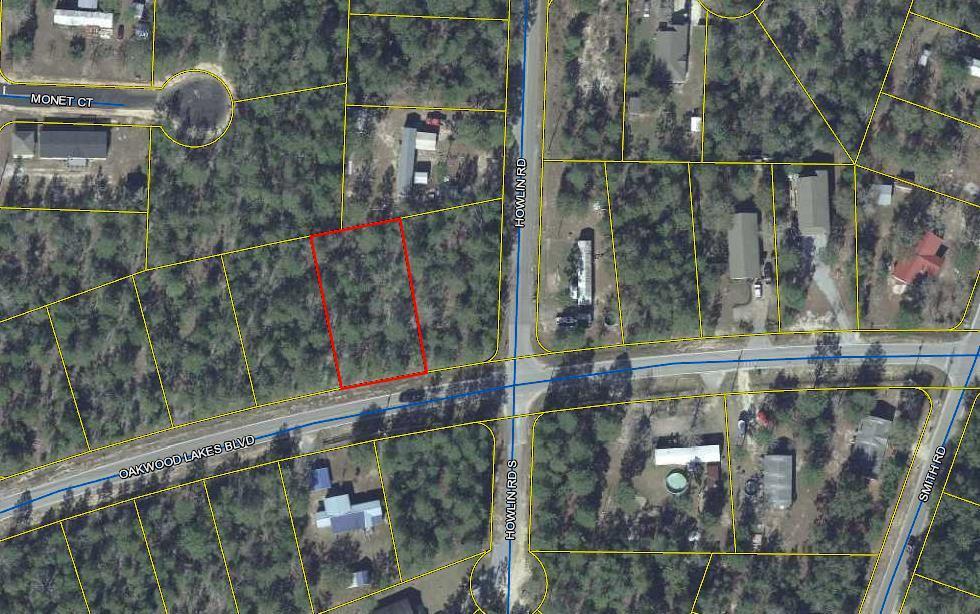 Nice Wooded Building Lot in growing Oakwood Lakes Estates. Paved Road. Water and Electric available. Tap Fee due. Build your dream home close to town and convenient to everything. Suitable for a stick-built home or for a mobile home.