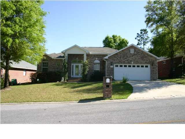 Beautiful home with 2 spacious living areas. One opens to the kitchen and has a corner fireplace and a tiled breakfast area - a great gathering place for the family. The other more formal living room opens to a formal dining area and has French doors leading to the back deck. Kitchen has beautiful cherry cabinets and granite counter-tops. Master suite has separate shower and whirlpool tub. All new carpet in the formal living room and 3 guest bedrooms. This is a beautiful home. Option to buy this home
