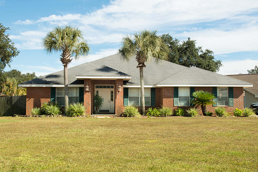 Updated brick home on beautiful corner lot in Holley By The Sea! Features include new cabinetry in the kitchen, open kitchen and den area, separate dining and living rooms. Kitchen has new cabinets, granite counter tops, stainless steel appliances and a breakfast bar! Enjoy your gorgeous back yard paradise with an in-ground pool with gorgeous paver deck, Tiki hut, fire pit and surrounded by beautiful palm trees and privacy fencing. Great for entertaining! Lawn pump and sprinkler system on well. Large Storage shed. Separate fenced area for your pets! Enjoy all the amenities of Holley-by-the-Sea listed under project facilities! These include, pool, exercise room, sauna, steam room, tennis courts, beach, boat launch, fishing, pavilion!