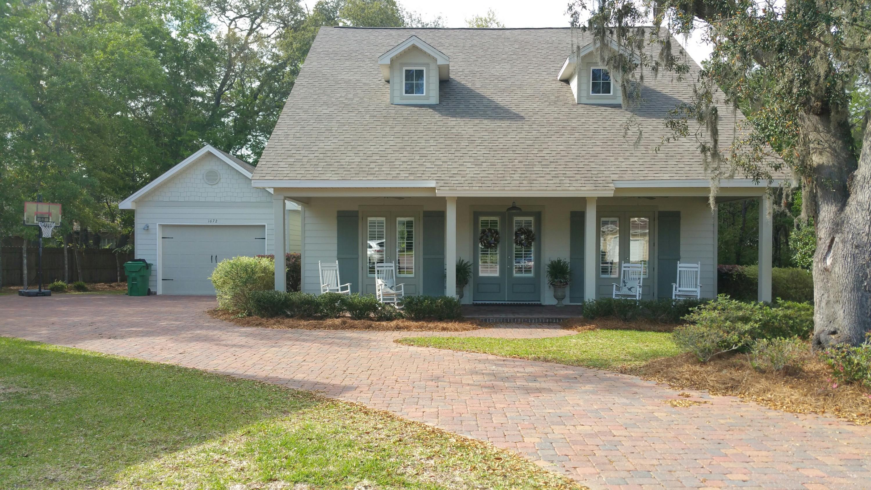 WOW! This is a must see home! Beautifully appointed in the much sought after neighborhood of The Parish at Bluewater Point! 4bedrooms, master and guest bedrooms on the first floor 3 baths, Jack & Jill bath between upstairs bedrooms,beautiful floors, granite countertops, stainless appliances, a loft area perfect for the children's play area or office space, large laundry room with cabinets galore and lovely plantation shutters! Beautiful finishes through out. Neighborhood dock great for putting in your kayak or canoe! Fenced, half-acre sized lot backs up to a wooded area. Quiet cul de sac and convenient to everything!
