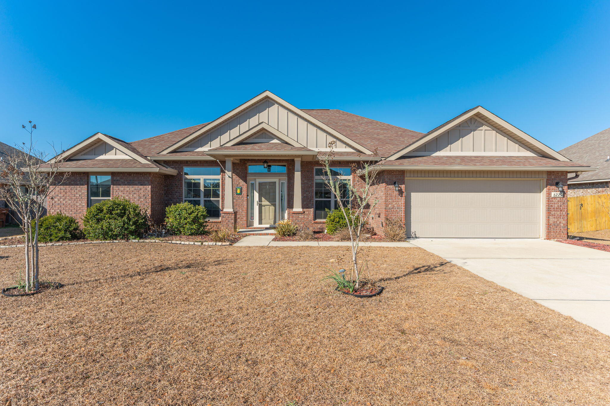 Built in 2019, this beautifully maintained Craftsman-style brick home offers 2,282 square feet of thoughtfully designed living space with 4 bedrooms and 3 bathrooms. The split bedroom floorplan provides both functionality and privacy, while the inviting living area features a fireplace that adds warmth and character to the home.

Enjoy year-round comfort in the fully enclosed sunroom, perfect for all seasons. Additional highlights include a whole-house generator, a fenced backyard with a storage shed, and a pergola that is already wired and ready for a future hot tub. The two-car garage adds everyday convenience, and the home has been exceptionally well cared for throughout.
 This property is move-in ready and offers a blend of quality construction, modern features, and comfortable living spaces, making it an excellent place to call home.