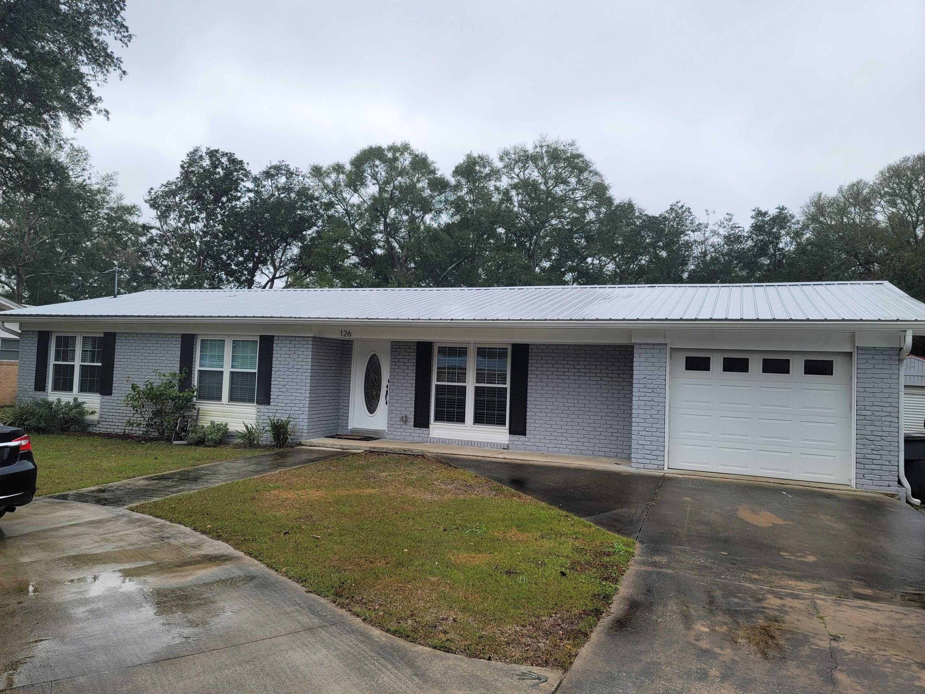 Located just seconds from Ferry Park in East Fort Walton Beach sits 126 NE Fulmar. There is plenty of guest parking in the half circle driveway but for you, feel free to use the garage. As you walk into the house from the garage or the front door, you will be greeted with a large open floorplan with the entire kitchen, living room and dining room in view. This home feels much larger than it's square foot footprint would suggest. The kitchen proudly boasts natural Dolomite countertops, soft close cabinets, and the backsplash to match. The stainless steel appliances include a stove area with a pot filler for making the chef's job a little easier. The living room has plenty of space and the entire home is layered with luxury plank flooring. Right off the the main living spaces is a half bath for you and your guests - no need to go down the hallway to use the restroom. Go ahead, let the spare rooms be a bit messy, nobody will see it! Rest assured, a large chunk of the main components of the home to include plumbing, electrical, HVAC, lighting, windows hot water heater, doors, to include the garage door and irrigation system are only a few years old. The back yard along with the large back patio and deck are great for entertaining guests and it has a large shed with electricity in the back as well as an outdoor shower. Once it's time to retire for the night you will walk by the laundry closet and a two bedrooms on the left and a full bath on the right. The master bedroom is spacious and the master bath includes a dual vanity. Not only is the home amazing but Elliott's Point is one of the most desirable neighborhoods in this side of town for a reason. it's proximity to Ferry Park that includes disc golf, basketball courts, tennis, soccer, playgrounds, a walking/jogging path and so much more. A few short minutes drive to groceries, shopping at Uptown Station and of course, downtown Fort Walton Beach. The powder white beaches are just a few minutes away as well as both bases. This home has so much to offer, don't miss out before it's gone.