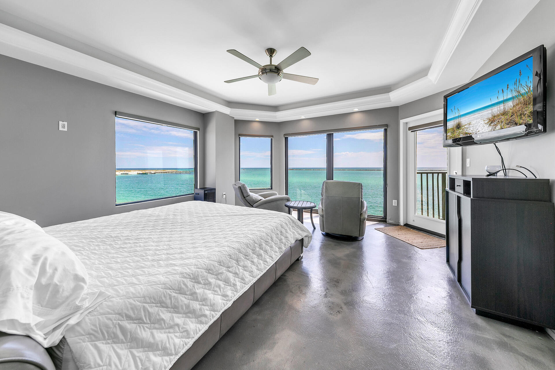 Gorgeous modern unit in the sought-after Waterview Towers Yacht Club. The views are some of the best that Destin has to offer.  Every room has a view of either the Gulf/Pass or the Harbor. During the daytime watch the boats coming and going through the Pass and at night switch to the other side of the unit for the lights on the Destin Harbor. There are always fabulous views to enjoy. The unit consists of 4 bedrooms and three full Baths with high end modern finishes throughout. This unit also comes complete with covered parking in the garage and a large storage unit. Waterview Towers Yacht Club offers a pool, hot tub, owners lounge, fitness center and a marina. Boat slips do come up for sale from time to time.  Complex does not allow short term rentals must be 30 day minimum.