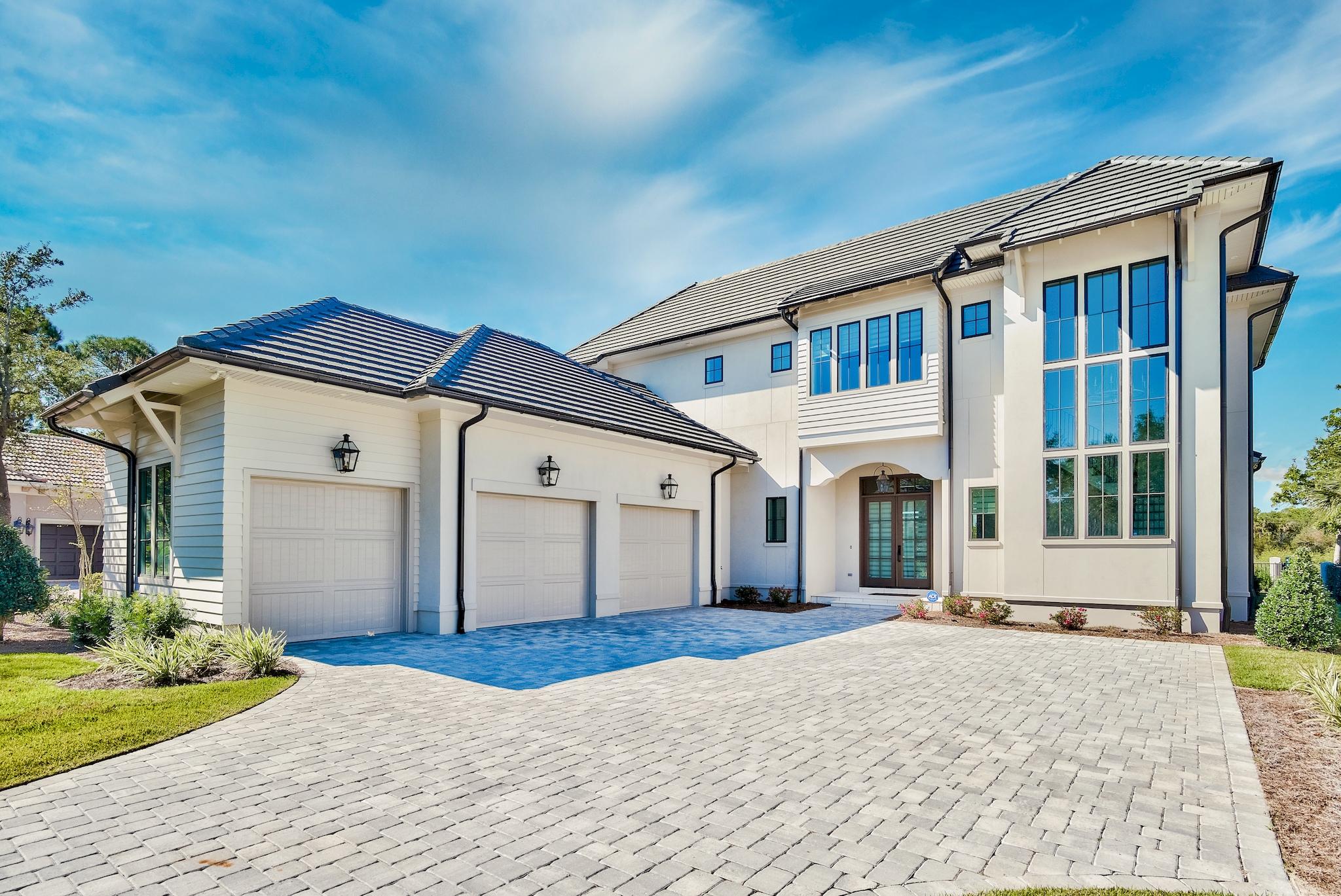 When you purchase in Regatta Bay you are purchasing more than just a home you are buying a lifestyle. Regatta Bay is located in the middle of Destin's finest shopping and activities. Leave the car at home and jump on your golf cart to enjoy shopping or dining at Destin Commons, boating at Legendary Marine or a round of golf at Regatta Bay's #1 ranked golf course. The list goes on with a short bike ride or golf cart ride to Whole Foods and several of the area's finest restaurants.
This beautiful custom home is situated on both golf course and lake offering breathtaking views. Newly constructed and built by Destin Custom Home Builders who pride themselves on going above and beyond what is expected by using only the best materials and techniques such as: