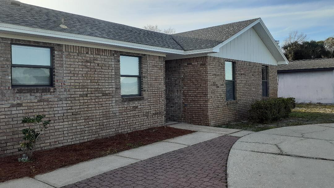 Freshly painted very clean cottage style home. Tile through out, stainless steel appliances,
marble shower in bathroom, large back yard, covered porch with outside bar area and one car garage. Located in the middle of Destin.