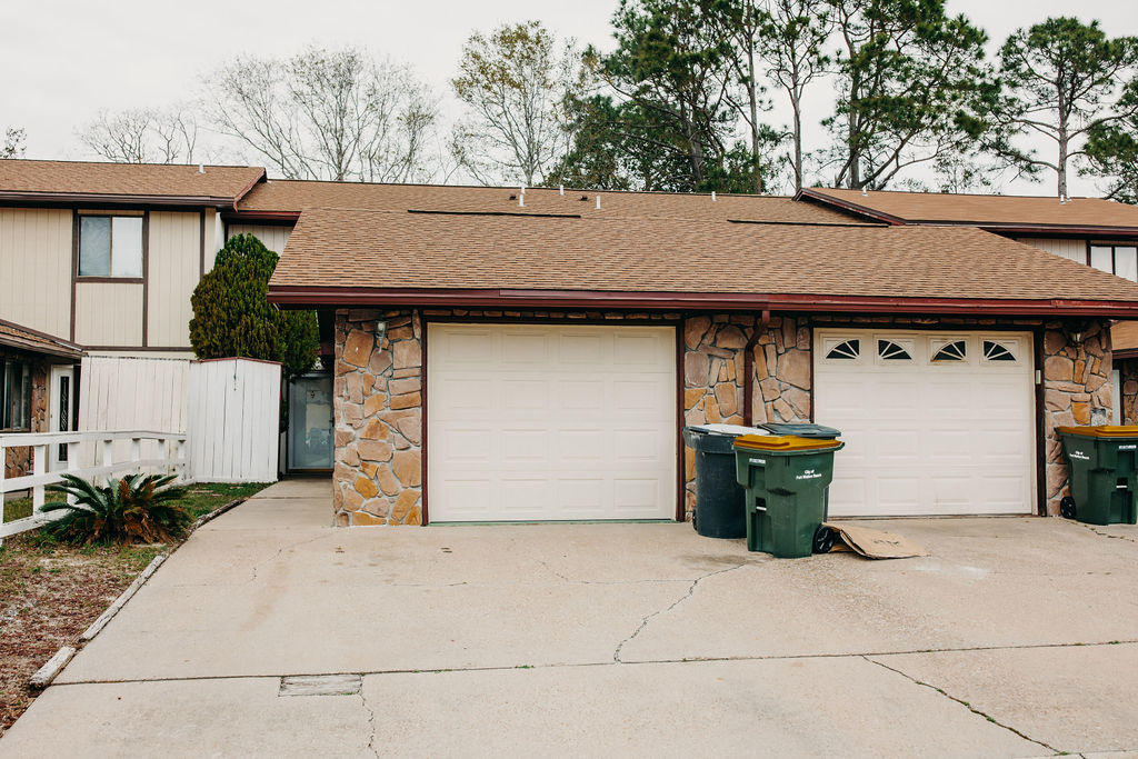 Here's your chance to own a 3 bedroom, 2 and a half bathroom condo east of Hurlburt field and close to everything! This gem is also directly across from the best park in the FWB area - so it's perfect for families, military people and anyone who needs a great place close to Navarre, FWB or Destin! Fresh paint in many rooms, new carpet down stairs, new stove and did we mention...an ATTACHED 1 car garage?? This opportunity is perfect for investors (7 year rental history available upon request) as well as anyone searching for a great value that is also perfectly located! Yes - this one is a must see! It won't last long!