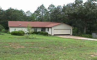 Great home with half acre lot is a great little find. Tile floors in the foyer, living room, dining room, and hall. Great if you have allergies and can't do much carpet. Vaulted ceilings in living room and master bedroom and a sky light for natural lighting in the master bath. Even a fireplace in the living room to make this even cozier. Complete the big back yard with 2 storage sheds and totally fenced. Don't miss out on being able to call this home sweet home.