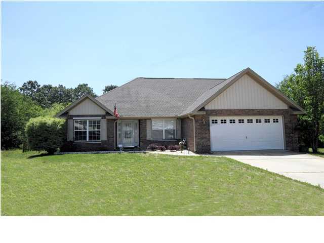WONDERFUL 3 BEDROOM PLUS OFFICE HOME WITH MANY UPGRADES !! Backyard leveled and is on edge of Pond with fish and the woods!! Front door with beveled glass door and two beveled sidelights greet you both outside and inside the home. Private Office with French Doors just off the Foyer! Living room is large with vaulted ceiling and an overlook from the second story - It flows into Kitchen with Dining nook area and Breakfast Bar (all tile flooring) and formal Dining room with hardwood floor. Split bedroom plan with Master walk-in Closet and ''super'' bath with tile and glass shower and separate garden tub. Upstairs bedrooms share full bath with double sink vanity ! Downstairs private Hall half Bath for Guests !! Ceilings are not popcorn - they are orange peel texture.
