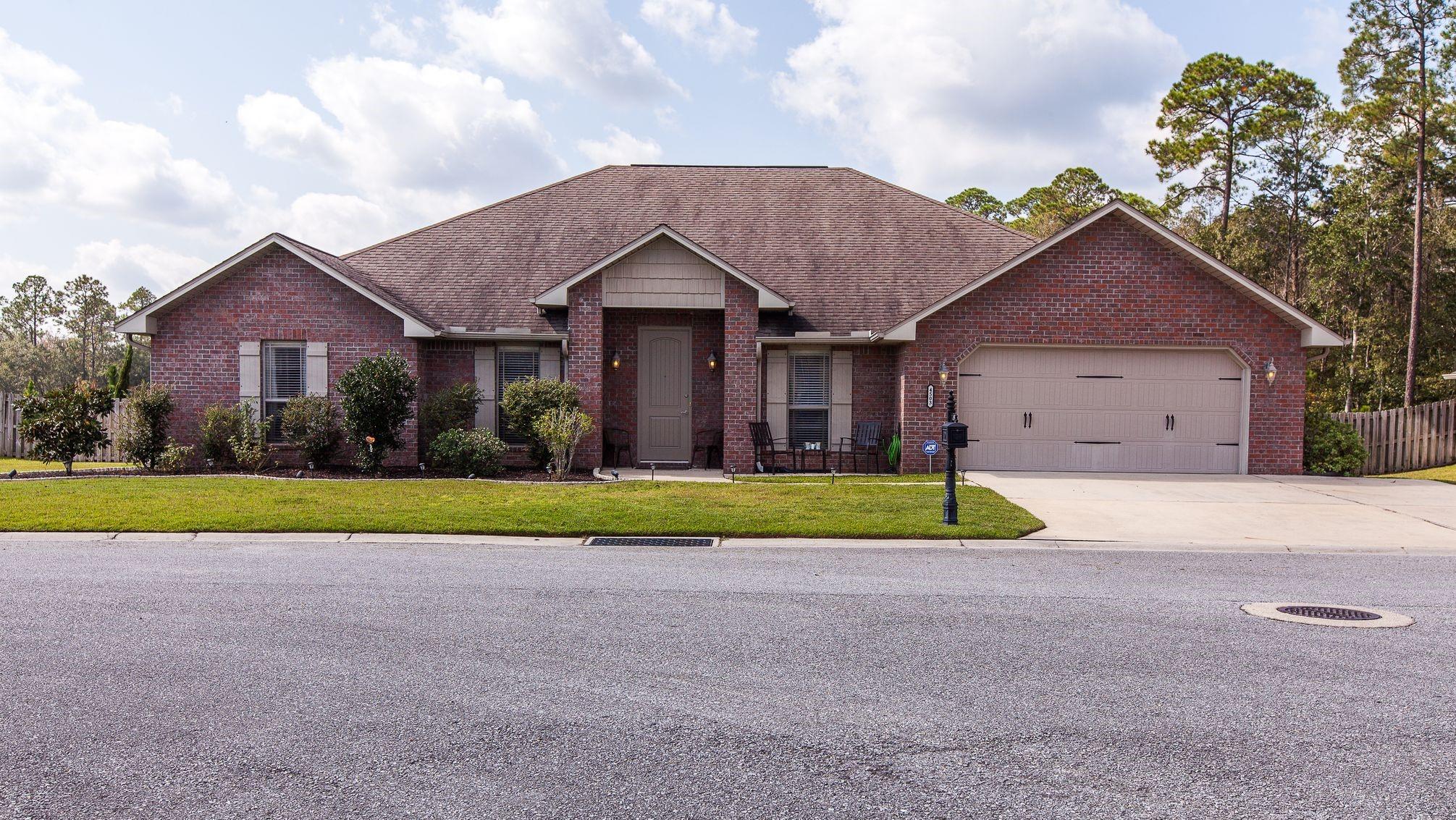 Stunning 5 bedroom, 3 bathroom home in the southernmost neighborhood in Crestview. Approx commute to 7thSFG/Duke: 10mins, Eglin: 20mins, Hurlburt: 35mins! Enter to raised ceilings & a formal dining room that leads to the living room w/double ceiling fans. The kitchen includes granite counters, custom maple cabinets w/soft close drawers & center island w/handy outlet for counter cooking appliances! Relax in the super spacious master suite with tiled bathroom with 2 walk-in closets, dual sink vanity, shower w/slab granite walls, garden tub, & separate toilet. The back patio has been extended for extra entertaining area and looks onto the natural preserve. Backyard is fully fenced   with a shed and new/additional patio that's a great space to roast marshmallows! See today!