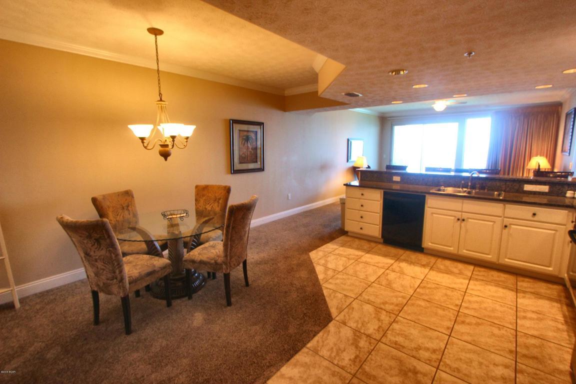 A true treasure of a condo and the popular Treasure Island which has one of, if not the BEST VIEWS on Panama City Beach! Enjoy sunrise views in the morning and Sunset views in the evening! The layout of this oversized condo's interior is superb for entertaining, offering 9' ceilings throughout and an excess of space and features, including slab granite countertops, granite backsplash and sleek stainless GE appliances in the gourmet kitchen, large bathrooms, and beautiful decorator perfect furnishings. The pet friendly complex has a large heated pool and a kiddy pool and two gazebos, covered parking, four high-speed elevators, fitness room, owner's lounge and game room. It is located on Thomas Drive within walking distance of Saint Andrews State Park and minutes from the area's finest dining and entertainment!