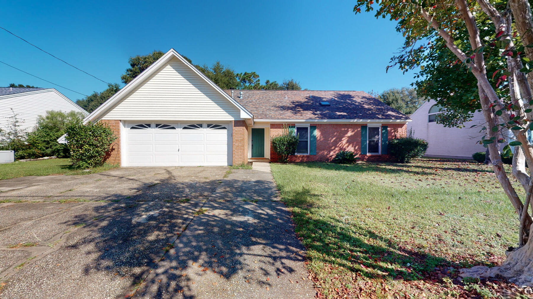 Great family home south of Interstate 10 with easy commute to Duke Field, Eglin and Pensacola.  When you walk into the great room you are greeted by a wood burning fireplace and cathedral ceilings with site lines to the back yard and screened in patio.  The downstairs bathrooms have been remodeled with granite counter tops, tile bath/shower enclosures and tile floors.  There are three rooms on the main floor with two more on the second floor.  At the top of the stairs is a loft area overlooking the great room that would make a great work, games, or reading area.  New roof 2019, No HVAC 2021. Don't miss out on this great home in sought after Southwest Crestview.