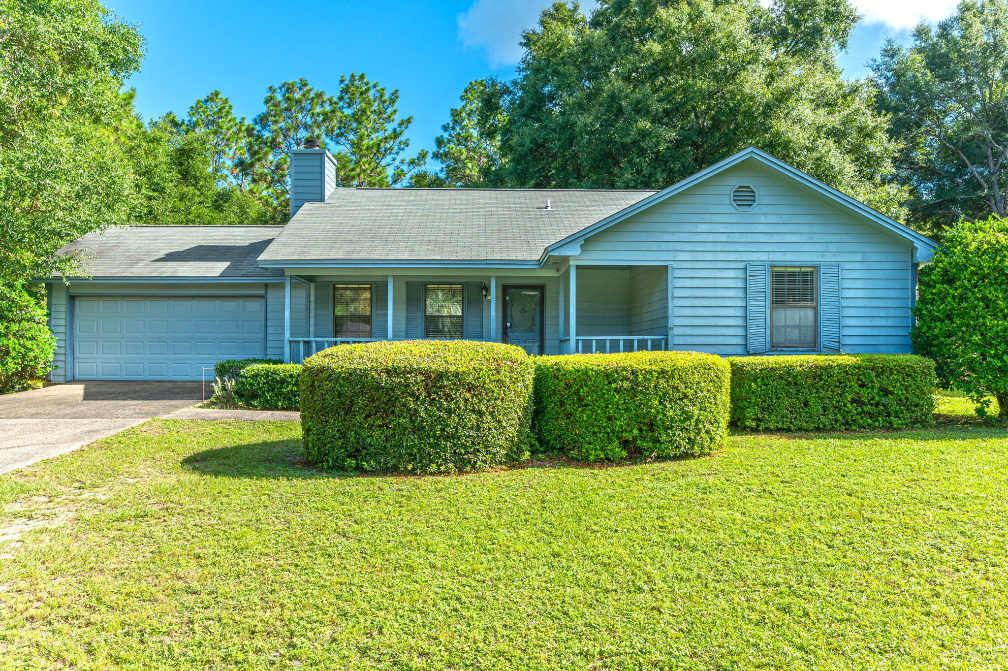 CUTE as a button! This sale includes the lot located next door, totaling .8 acres of land! Plenty of level topography to utilize the yard(s)/vacant space for any buyer's needs! This 1200 SF home has been maintained to perfection, with all major systems updated in the past several years: roof 2014, HVAC 2016, and water heater 2018. Main living space provides for excellent use of space with vaulted ceiling and floor to ceiling bricked fireplace. Galley kitchen with breakfast bar offers plenty of cabinetry and counterspace! The backyard is partially fenced and offers plenty of room. Both front and back porches add to the charm on this home! Schedule a showing today!