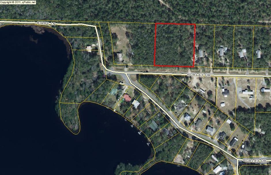 DOUBLE LOT NEAR LAKE JUNIPER -- Here's the perfect 2+ acre lot on a paved road within view of Lake Juniper and close to town. This lot is lightly wooded and level. Electric and City water are available (tap fee due). The land consists of 2 separate lots under one parcel ID number, so you could build on one lot and keep the other for recreation and privacy, or build an additional house on the second lot, or sell the second lot for a profit. There is no survey on file, but the corners of the property are clearly marked. All dimensions, square footage, and suitability for building subject to verification by buyer at buyer expense.