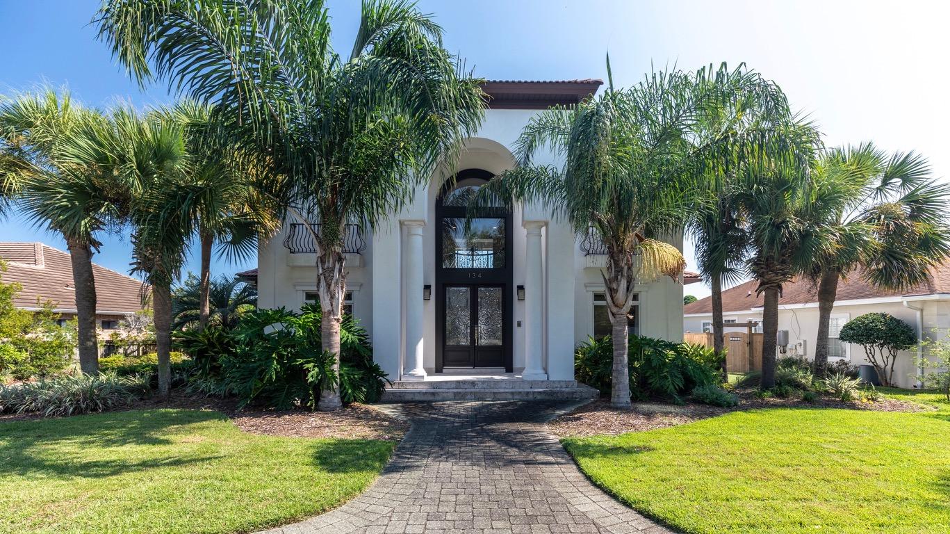 One of the finest luxury homes on deep water in Indian Bayou. This 3 BR home with attached 4th bedroom/office has views of the bayou from both floors. This home is an open floor plan that opens to a beautiful pool area over looking the bayou. The dock has a High Tide 20,000 lb. boat lift to accommodate many different kinds of boats. The house is also a smart home, can be controlled by phone. This home also features a Home Theater with 80 inch LCD TV and 120 inch drop down projection screen and drop down projector and 7.2 Eclipse surround sound system. There is also an air- conditioned garage with cabinets, work benches, 60 inch TV with surround sound stereo system. The garage also includes a commercial ice maker and bathroom that can be used off the pool area too. A must see!