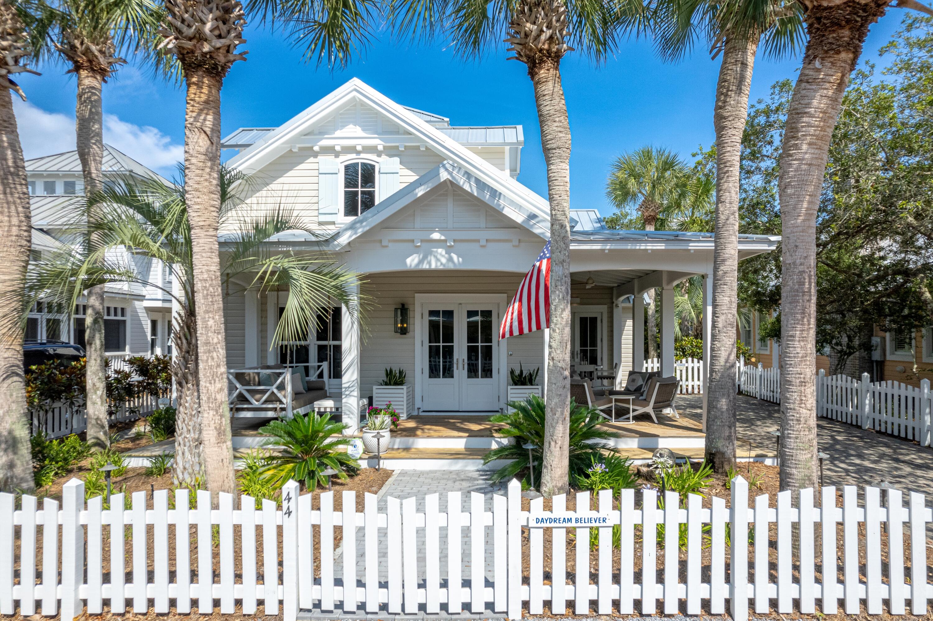 A complete remodel transformed this cottage into the jewel it is today!  Contemporary and bright, this beautiful home shines like no other.  The wrap-around porch is perfect for outdoor living and entertaining.  The stunning interiors are reveled as soon as you step inside, beginning with the soaring ceiling height. Maple floors and white ship-lap walls are used throughout the entire house. Additional features include custom made modern cabinetry, Silestone countertops, concrete resin dining table, high-end appliances - Bosch oven and microwave, Wolf induction cooktop, Sub Zero refrigerator, Whirlpool washer and dryer, tankless water heater, new windows, doors, and roof.  Both new and antique furnishings were carefully hand selected from Provincial France mixing old and new furnishings to create a comfortable beach living experience. The redesigned kitchen includes a pantry, wet bar, and a plethora of storage. Only the best finishes and carefully selected fabrics were used for all furnishings and window treatments. Two guest bedrooms with king beds and private baths are located on the first floor. The second level includes a media loft with queen sleeper sofa and master suite. The master suite includes dressing area, double vanities, separate shower, and soaking tub. The third level is the tower bedroom with two built in beds, storage beneath and a half bath. The backyard provides additional entertaining space or build a complimentary guest cottage.  Only four lots in from 30A and just a quick walk to the west end pool makes this the ideal location for your beach getaway. Exterior storage and private parking onsite.