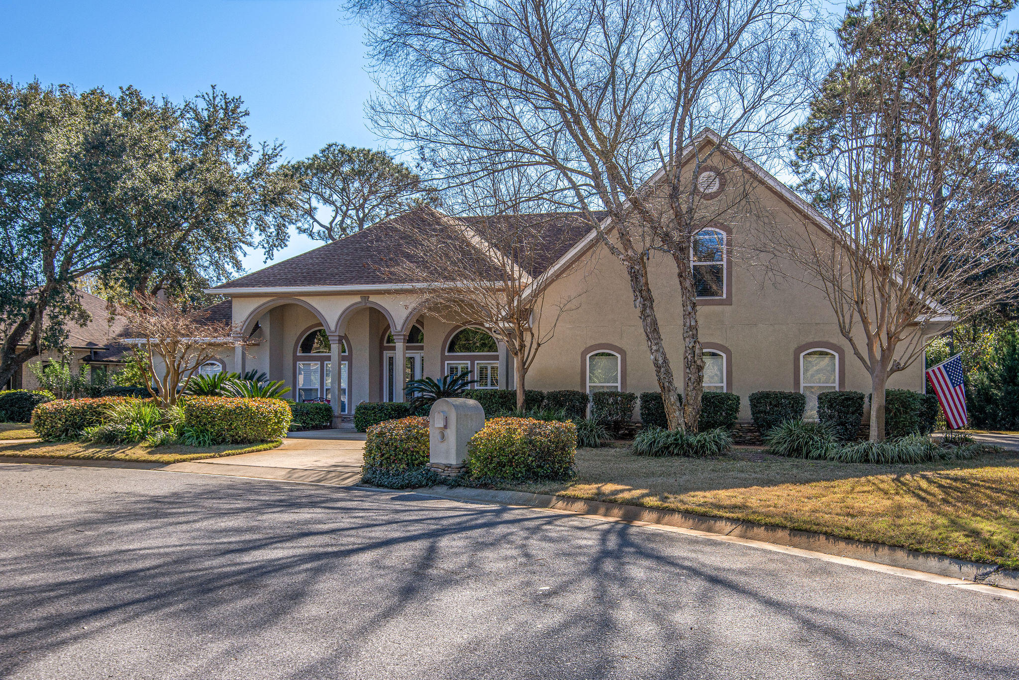 Luxury Custom-built Mediterranean style Home situated on Double Lot. Only 2 blocks to Community Boardwalk access to Santa Rosa Sound & approx 4.7 miles to the Beach.  This Gorgeous Home situated in a quiet neighborhood offers features galore, ASK agent for FEATURES SHEET to see the MANY reasons to make this your home! For example: 14 ft. exquisite coffered, dropped & raised trey ceilings w/faux finish & decorative crown moldings, in-wall sound & security sys/cameras, Gourmet kitchen with Custom Cabinets, granite counter-tops, SS appliances, island, & walk-in pantry. Master Bdrm has large Walk-in Closet w/built-ins, bidet, jetted tub, Oversized shower. Picturesque large screened lanai has a wet bar, in-ground gunite heated saltwater pool w/waterfall & tropical landscape