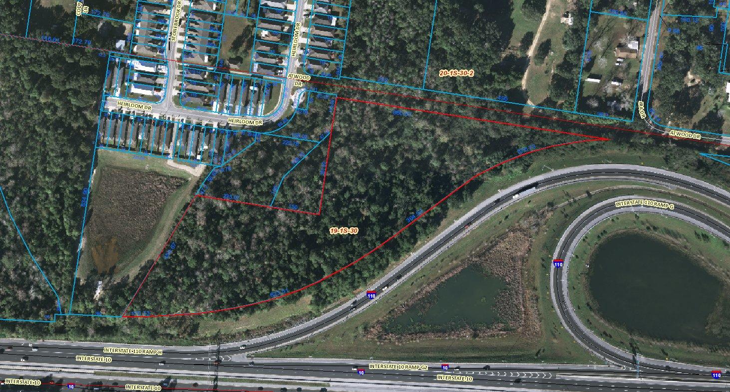 9.15 AC
 1,610 FT Frontage facing I-10
 Dimensions 880.67 x 1,683 x 830.67
 Zoned HDMU
 PID 191S301301000003
 Potential as SF Development Site, but has other uses under HDMU zoning- Retail, commercial and multi-family.
 The property is adjacent to Silverton Subdivision in North- Central Escambia County off of Olive Road. Interstate 1-10 and I-10/110 intersection border the property to the south. Accessible by Ira Drive.