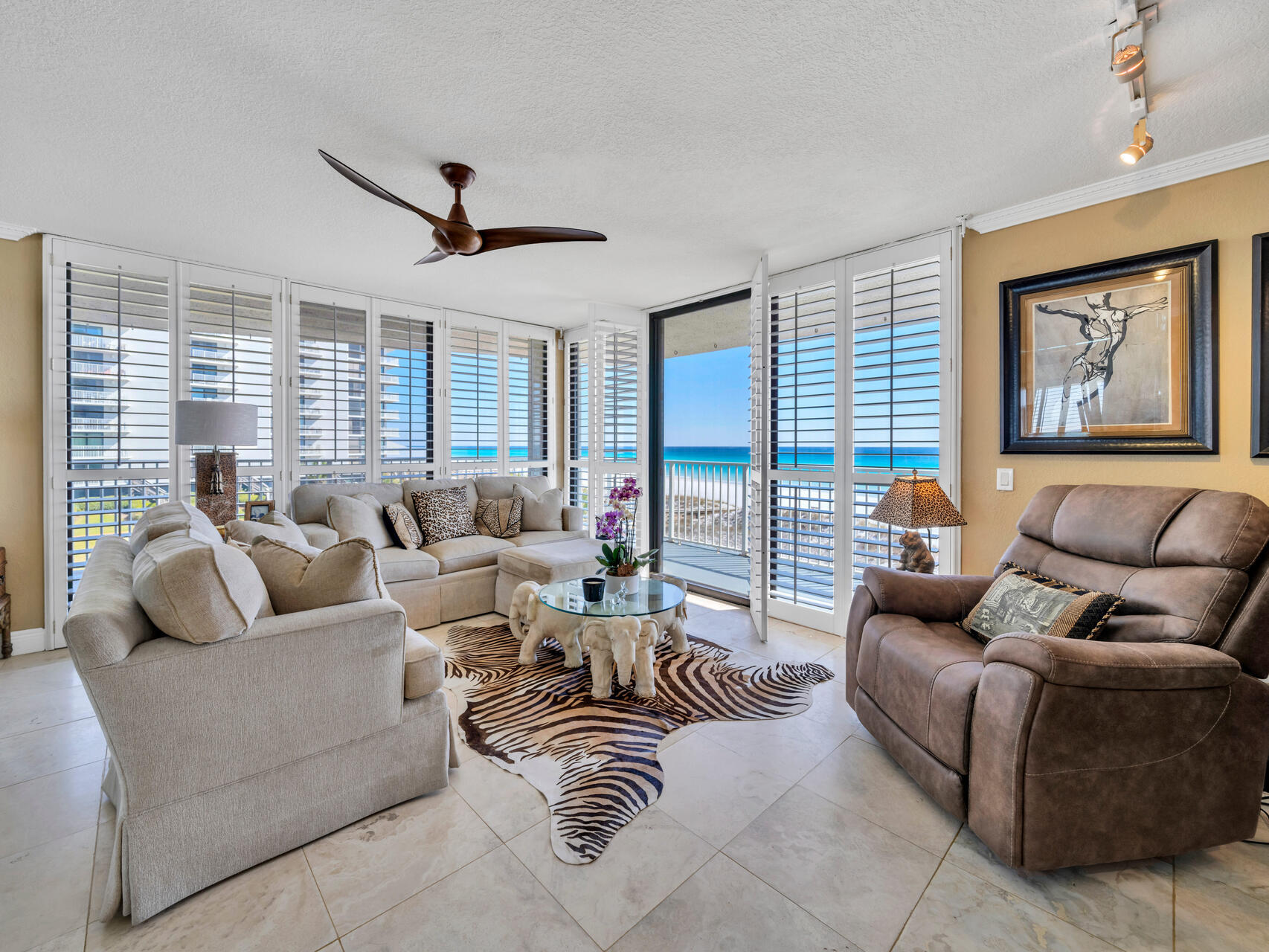 Experience the ultimate beach lifestyle in this highly sought-after front unit at Mainsail, boasting stunning panoramic Gulf views. This 2-bedroom, 2-bathroom residence spans 1,315 square feet and features a large wrap-around balcony over 50 feet long, offering breathtaking beach vistas from every angle. Originally designed as a 3-bedroom unit, the third bedroom has been elegantly transformed into a dining room, with the option to easily revert it back to a Gulf-front bedroom.

The spacious master bedroom is a true retreat, featuring magnificent Gulf-front views and direct access to the balcony, perfect for enjoying morning coffee or evening sunsets. This unit is one of only 16 in the complex with this unique floor plan, making it a rare find that seldom comes on the market. The chef's kitchen is a delight, showcasing granite tile countertops, white appliancesincluding a glass-top stoveand a breakfast bar that frames exquisite views. The expansive open living area is adorned with plantation shutters and beautiful travertine floors, creating a warm and inviting ambiance. For added entertainment, a wet bar completes the living space.

Mainsail Condominium offers a wealth of amenities, including two pools, a hot tub, covered parking, tennis courts, shuffleboard, pickleball, a game room, and a fitness center, ensuring endless opportunities for recreation and relaxation. With over 700 feet of pristine beachfront along the Gulf of America, this unit is an exceptional opportunity for a second home or rental investment. Don't miss out on owning your slice of paradise with captivating views of emerald waters and golden sands. See you at the beach!