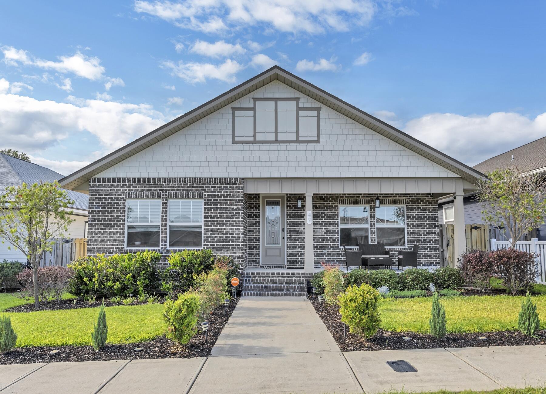 MOVE IN SPECIAL- $500 of 1st month's rent! 3bed/2.5bth custom home. Covered porch, 10 Ft. ceilings w/crown molding, LVP flooring throughout home, tile in the Master Bath, &  rear facing Garage. Chef's kitchen boasts custom painted Ivory cabinetry, granite countertops, large pantry, & stainless appliances (including an oversized commercial grade refrigerator/ freezer). Bedrooms 1 & 2 are located at front of the home. The Master Suite is in rear of home has 2 large walk-in closets, a marble walk-in shower with glass enclosure, a whirlpool garden tub, & a double vanity. Covered porch. Breezeway from the garage area connects to the the rear porch. NO smoking; cats/small dog allowed upon approval with a non-refundable fee. 600 minimum FICO credit score required in addition to meeting criter