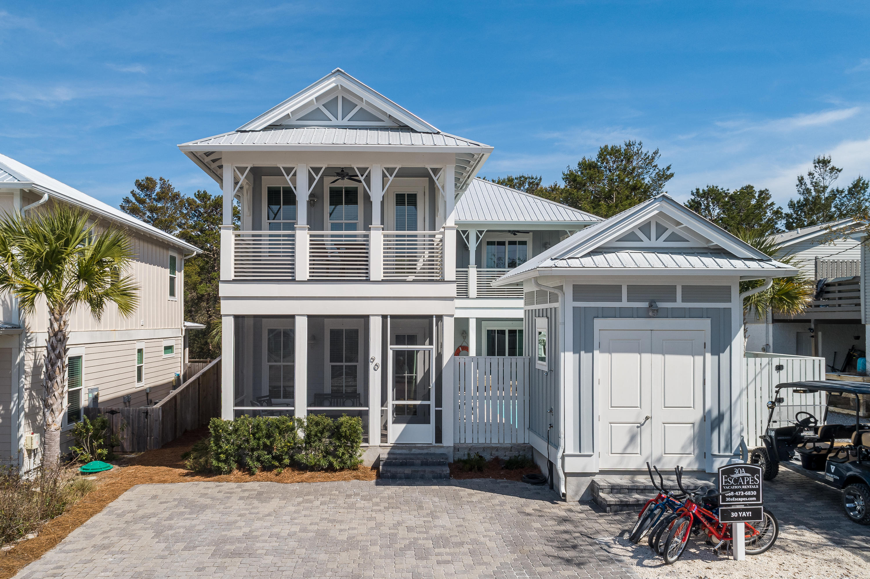 This stunning custom home features 3 master suites and numerous upgrades throughout, including the luxurious furnishings.  Each suite has its very own porch as a bonus.  It is located in the highly sought area of Old Seagrove Beach with two beach accesses close by.  The house has an open floorplan that spills into the pool area with a master on the first level along with the main living areas and kitchen, which has upgraded appliances and fixtures.  The floors are made of eucalyptus and there is shiplap in all common living areas.
The oversized 12'x24 'pool creates an outdoor oasis with its private cabana and bar, upgraded travertine on the pool deck, custom glass tile and gas grill.  The backyard is the ultimate in privacy!  The house is currently on a rental program and has repeat clients come back year after year.