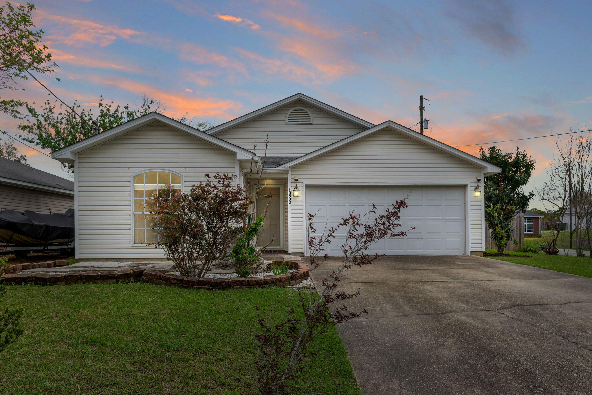 This charming cottage-style home offers the ideal opportunity for first time buyers or those looking to downsize, all nestled on a spacious corner lot within the welcoming and sought after neighborhood of Maple Oaks West. The community is off of Hwy 29 and just minutes to Pensacola Beach or the popular Downtown area. Inside features include a split floorplan, dining space, breakfast nook, granite counters, bamboo flooring, and double doors that lead out from the living room to the lanai. Major updates have already been completed for the new owners: Roof 2021, HVAC 2021, Water Heater 2022, and side fence in 2023. There is also a current Arrow Exterminators Termite Warranty that can be transferred to the new owners. All kitchen appliances, security cameras, washer and dryer are included!