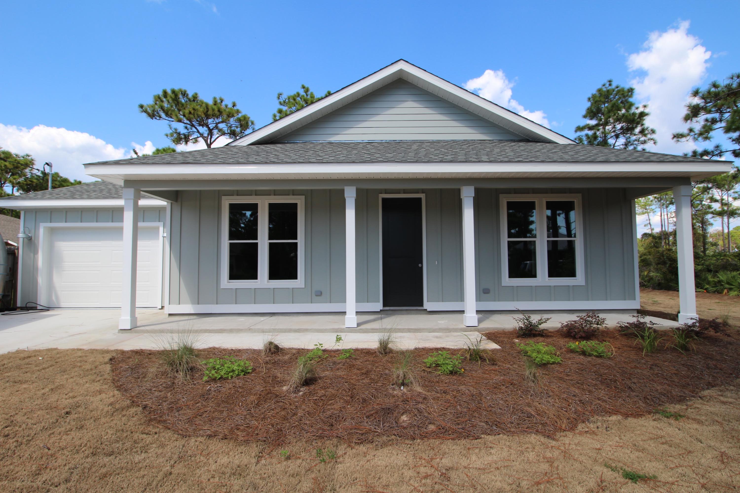 Brand New 3/2 with single garage on large cul-de-sac lot. Open concept Living Space, kitchen features white shaker style cabinets 8' island, granite counter tops, stainless steel appliances including refrigerator and large pantry. Living room with waterproof wood look flooring makes this a family friendly home. Faux wood blinds included.Master bath has double sinks and tile shower. This home is located within minutes of Grand Blvd, Sacred Heart Hospital and 30A beaches!