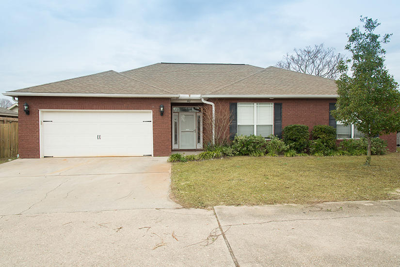 Buyers financing fell through!  Their loss is your gain! Don't miss out on this great 4 bedroom brick home so close to Hurlburt Field, shopping, beaches and school. Split floor plan with an open kitchen/living area that is great for entertaining.  The kitchen has granite counters, tile backsplash , black appliances , breakfast bar and cabinets have crown molding. Tile in wet areas.  Master bedroom has treyed ceilings and walk in closet.  The back yard has a deck with Pergola for outside barbeques and fun!
