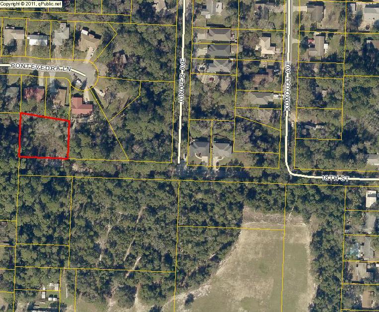 Centrally located and .49 acres of vacant land just waiting for the perfect owner who is looking for a buffered, tucked away parcel. No HOAS for the neighborhood. Mostly cleared with 200 feet of driveway access. Note: some wetlands on NW end of property. Listing will also be offered as residential single family with new home plans seller had drafted for this parcel.