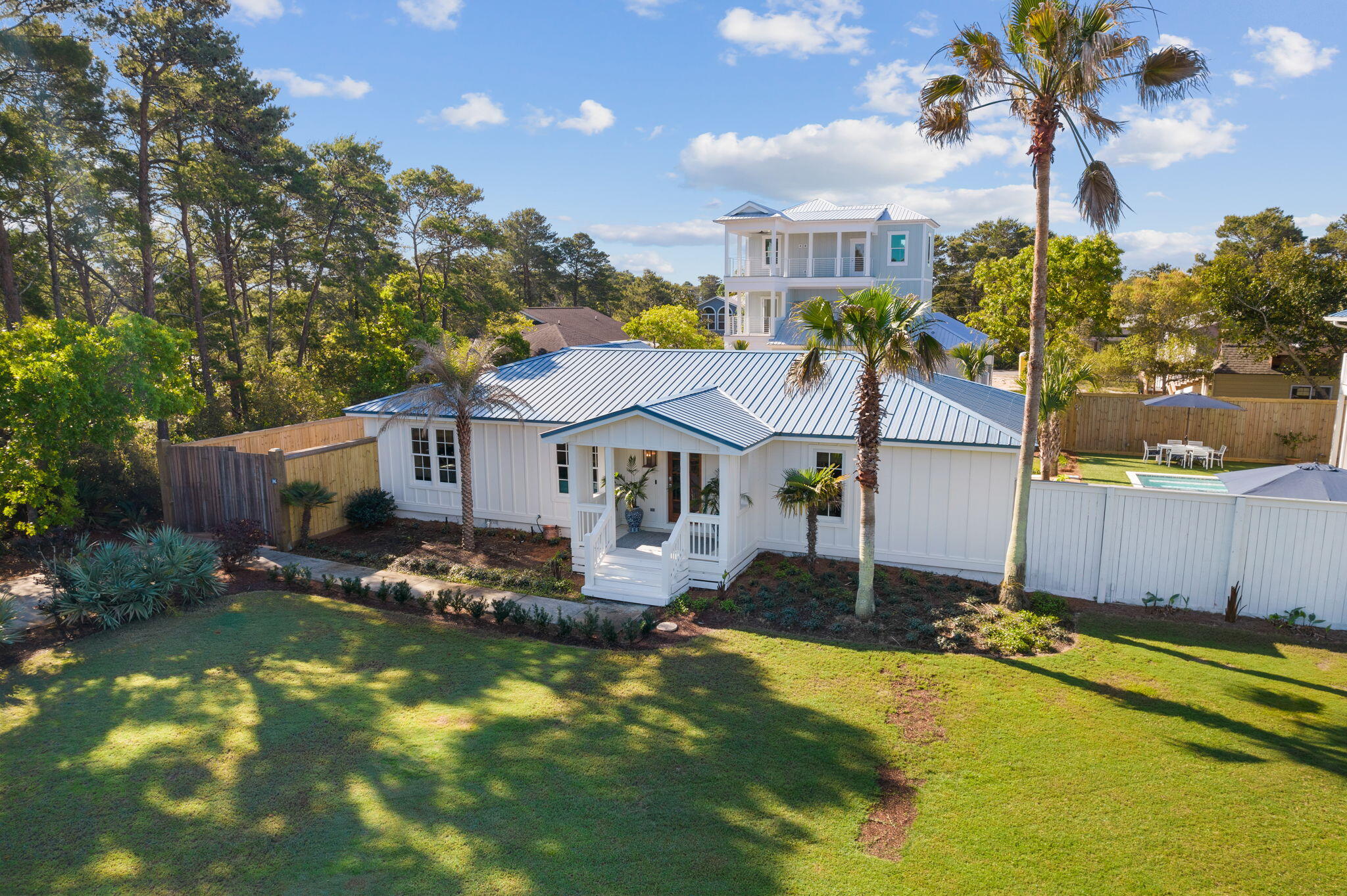 If you've been searching for the perfect blend of coastal luxury, location, and investment potential, look no further than this stunningly remodeled Florida beach cottage in the quintessential community of Gulfview Heights located on the popular west end of 30A. Thoughtfully curated for modern living and effortless entertaining, this coastal gem boasts a spacious open-concept floor plan, three generously sized bedrooms - including a primary ensuite - spacious closets and well-appointed updated baths. Culinary enthusiasts will love the spacious and sophisticated chef's kitchen that features high-end quartz counters, custom tile backsplash, wine fridge, custom cabinetry with ample storage and a full suite of stainless appliances. You'll enjoy spending quality time outdoors on the screened-in back porch that seamlessly extends your indoor/outdoor living space creating the perfect backdrop for dining al fresco or relaxing with a morning cup of coffee or evening cocktail. Ideally situated on a generously-sized lot measuring 75 x 110, there's plenty of room to add a pool, spa, detached garage or carriage houseallowing you to further enhance the property's value and appeal.

No detail was overlooked in the exterior remodel, with durable hardi board and batten siding added for enhanced curb appeal and long-term value. The addition of a custom 8-foot privacy fence, lush landscaping, and detached outdoor cabana creates an oasis-like feel that complements the surrounding natural beauty. Essentially taken down to the studs, key updates made during the remodel include all new wide planked flooring, new kitchen, new baths, new doors and windows, roof (2017), HVAC (2019), and water heater (2022). 

Ideally located just moments from 30A's hallmark sugar sand beaches and turquoise waters, this home is conveniently located near multiple public beach accesses, popular local eateries, shopping and a vibrant live music and entertainment venues. With no HOA restrictions, it's an excellent choice for short or long-term rentals, making it a savvy buy for investors looking for strong rental projections.

Whether you're seeking a vacation home, second residence, or high-income generating investment, this exceptional property at 106 Ash Street in Santa Rosa Beach offers endless possibilities. Schedule your private showing today and discover the incredible potential of this coastal sanctuary!Buyer to verify all dimensions.
