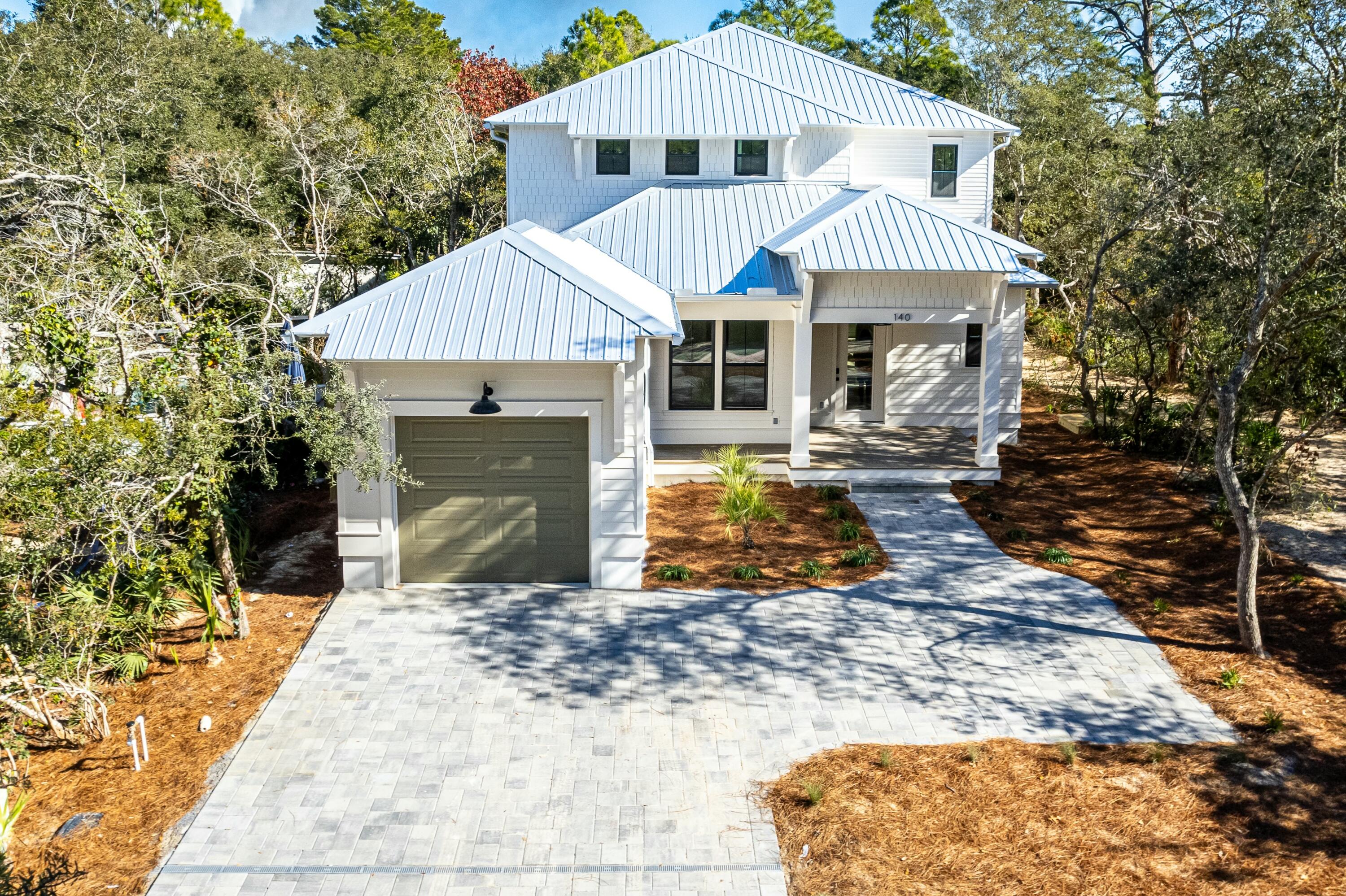 Introducing a new custom designed completed in 2025, this 5-bedroom, 4.5-bathroom with private pool nestled just off 30A in the desirable Seagrove Beach. Dedicated beach access. This location is ideal as a rental investment, a second home, or a primary residence 

As you step onto the inviting front porch, you're greeted by view of a private backyard oasis, complete with a heated pool and surrounded by lush trees. The first floor has a bright, open kitchen equipped with a butler's pantry and a beverage station featuring a drink refrigerator and ice maker. The primary suite on this level offers a spacious walk-in closet and an en suite bathroom adorned with floor-to-ceiling tile, a soaking tub, and a separate shower. Seamlessly blending indoor and outdoor living, the first floor extends to a large covered porch that overlooks the pool and the privacy of the tree-lined lot. The back porch is prepped with water, gas, and electric connections, ready for your personal touches of built in grill our outdoor kitchen. Rental projections of $200k in documents.

The second floor features four additional bedrooms. Bedrooms two and three offer en suite bathrooms and ample closet space, with direct access to a large screened-in back porch overlooking the pool. The sounds of the gulf just at the end of the street can be heard while relaxing on the porch.  The fourth and fifth bedrooms share a full hallway bathroom, ideal for a bunk room or king-sized beds. The upstairs is surrounding by trees offering a feeling of privacy at the beach.  

Situated in Gulf Shore Manor, this home is less than 0.4 miles from the beach, on a quiet dead-end street with a 30-foot buffer to Grove By The Sea, ensuring no neighbors on the west side. The community offers multiple beach access points, including the Santa Clara Beach Access with seasonal lifeguards and a ramp to the beach. As a non-HOA community, Gulf Shore Manor provides deeded beach access spanning 1400 linear feet from Dothan to Pelayo.