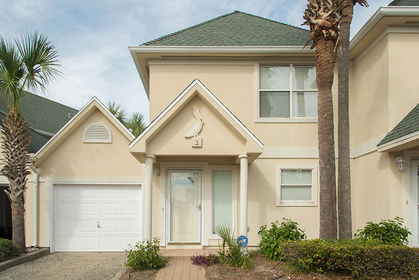 Perfect Location in downtown Destin! Close to beaches, shopping and restuarants! Very spacious 2 bedroom, 2 and 1/2 bathroom unit with a one car garage! Each bedroom has a private bath and a 1/2 bath downstairs for guests. There is a pool in the complex as well. Yard maintenance provided by the association. No smoking inside the home or garage.